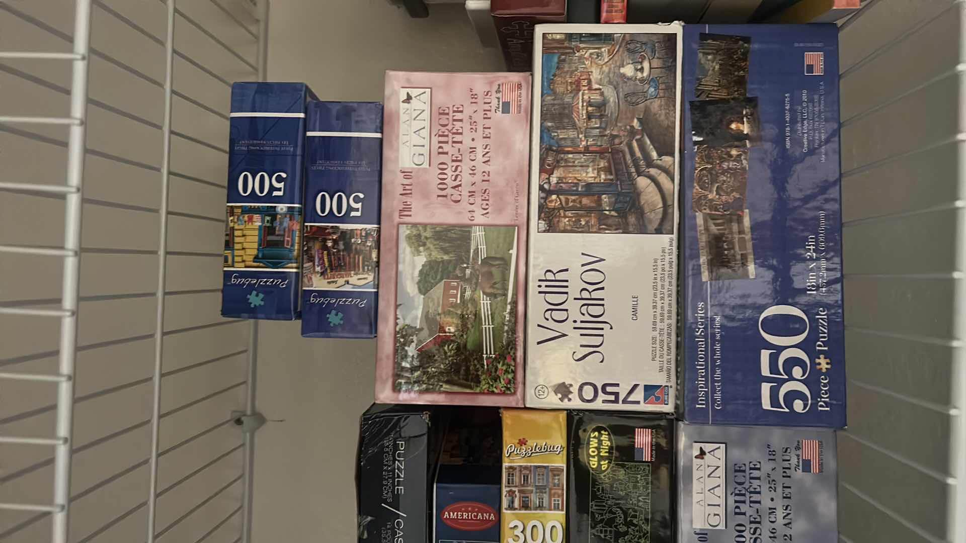 Photo 1 of CONTENTS ON SHELF- PUZZLES, BOOKS, VHS, AND MORE