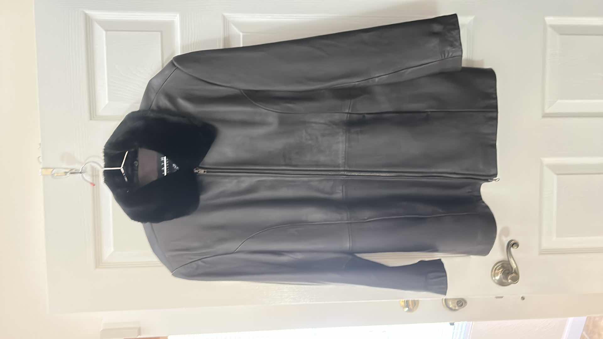 Photo 1 of BLACK LEATHER COAT WITH A REMOVABLE FAUX FUR COLLAR  BY LEATHER ELEMENTS. SIZE L