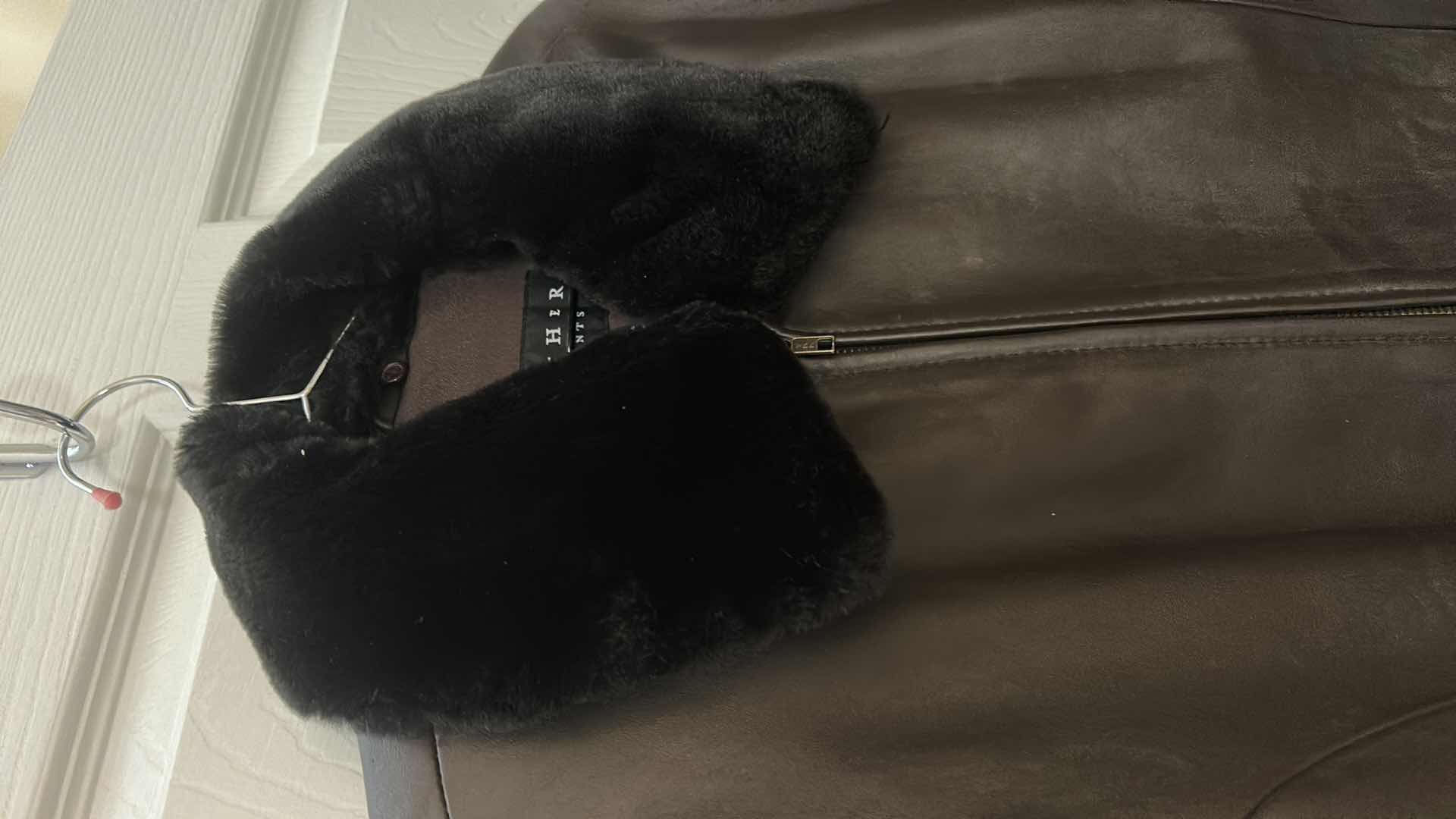 Photo 1 of BLACK LEATHER COAT WITH A REMOVABLE FAUX FUR COLLAR  BY LEATHER ELEMENTS. SIZE L