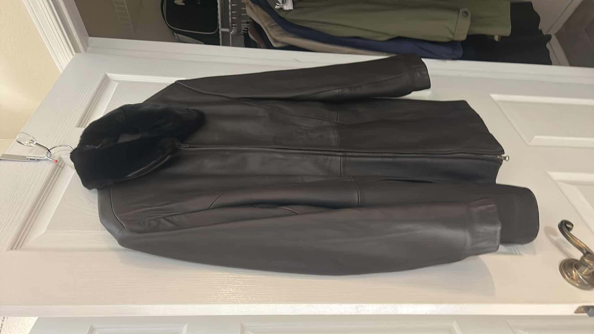 Photo 1 of BLACK LEATHER COAT WITH A REMOVABLE FAUX FUR COLLAR  BY LEATHER ELEMENTS. SIZE L