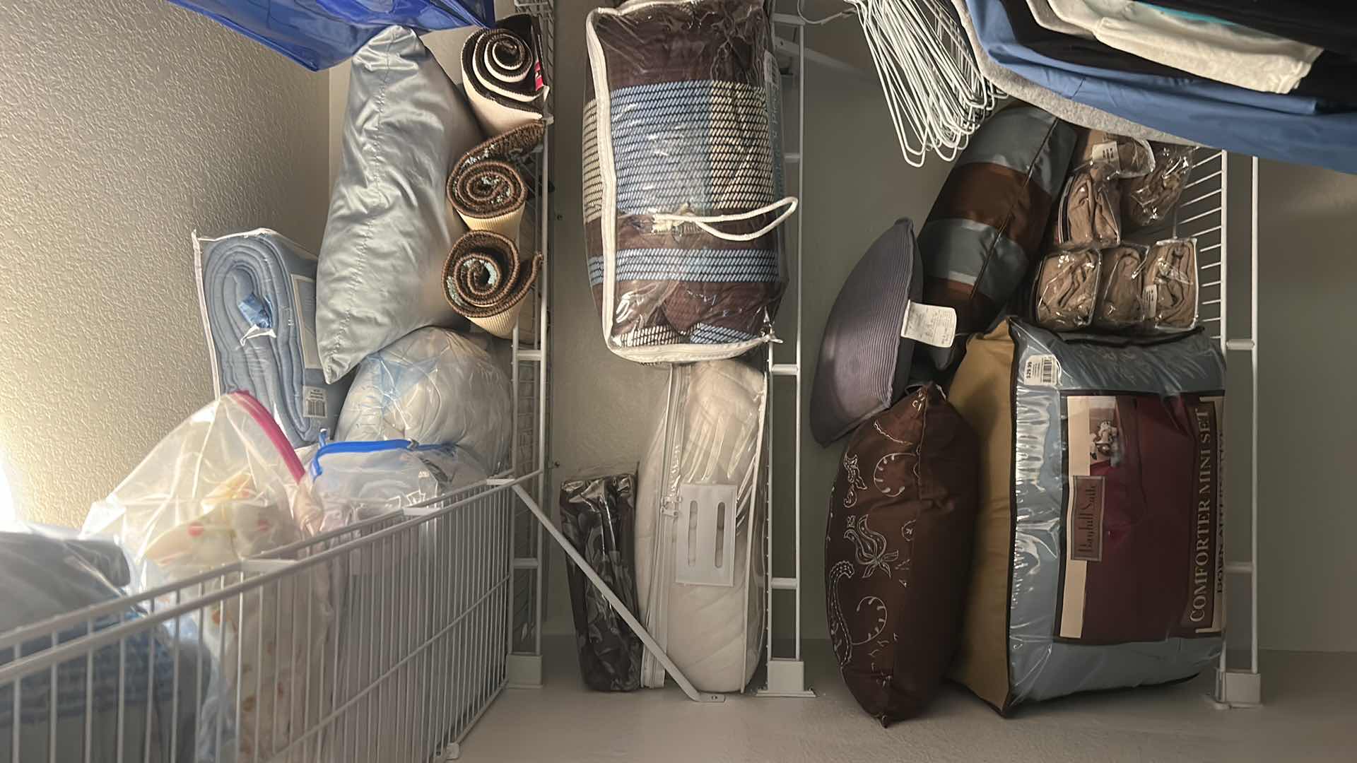 Photo 1 of BEDDING, CHAIR COVERS, RUGS AND MORE ON SHELVES IN CLOSET