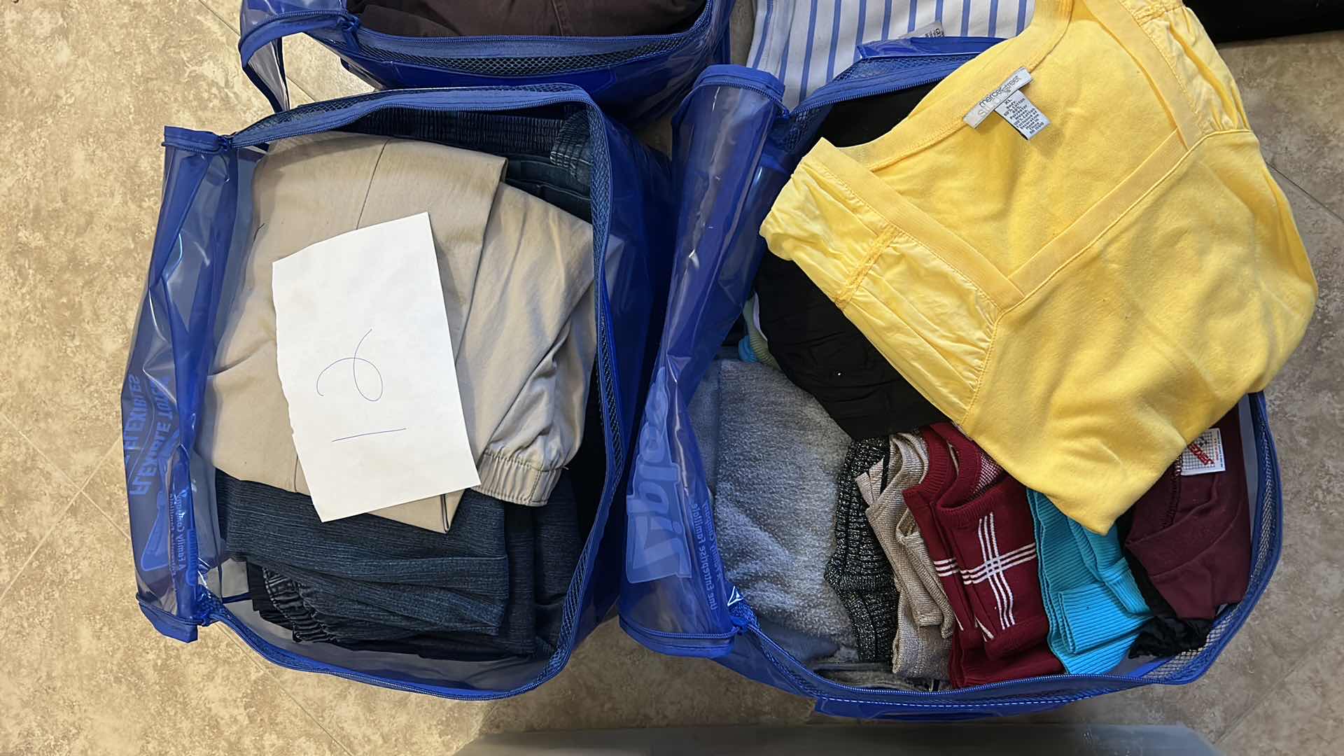 Photo 1 of 16 PAIRS WOMENS PANTS SIZE 12 AND BAG OF TOPS SIZE XL