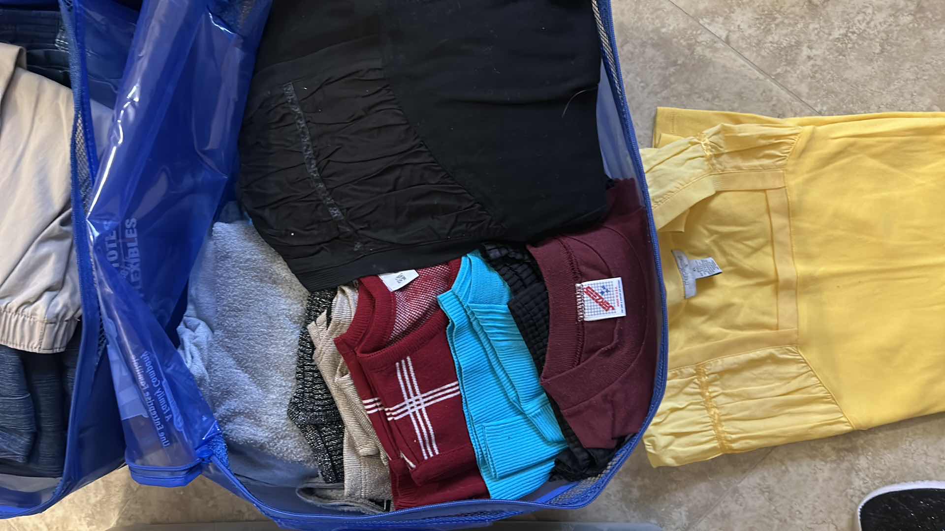 Photo 1 of 16 PAIRS WOMENS PANTS SIZE 12 AND BAG OF TOPS SIZE XL