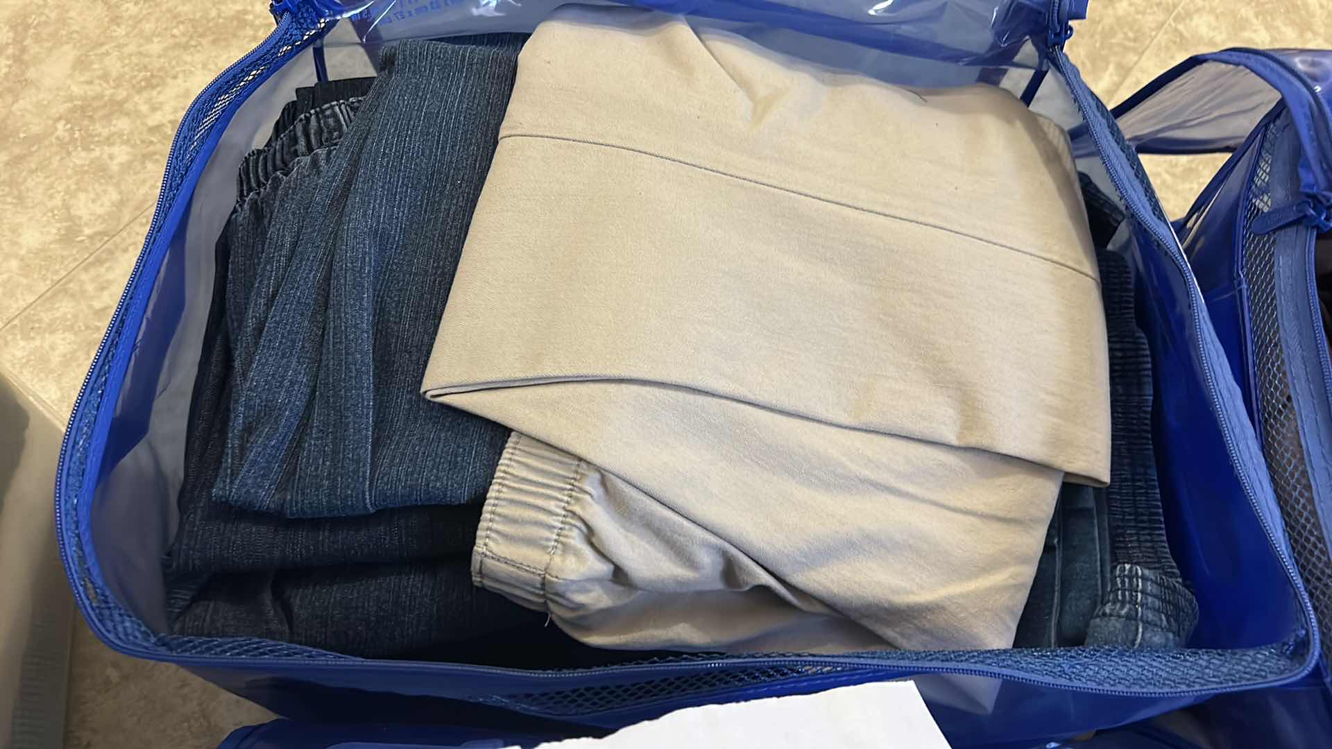 Photo 1 of 16 PAIRS WOMENS PANTS SIZE 12 AND BAG OF TOPS SIZE XL