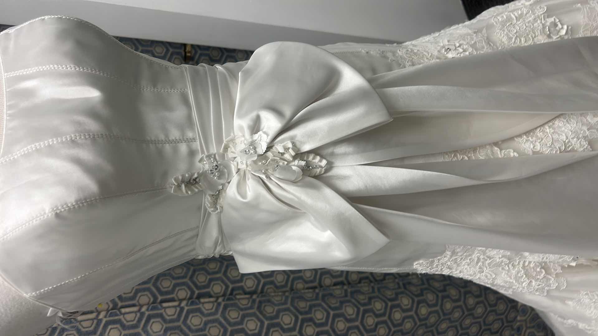 Photo 1 of BRIDAL GOWN “MAGGIE SOTTERO, IVORY ORGANZA AND TULLE WITH EMBELLISHED LACE, HANDMADE FLOWERS FEATURING LONG FULL TRAIN SIZE 8-10 