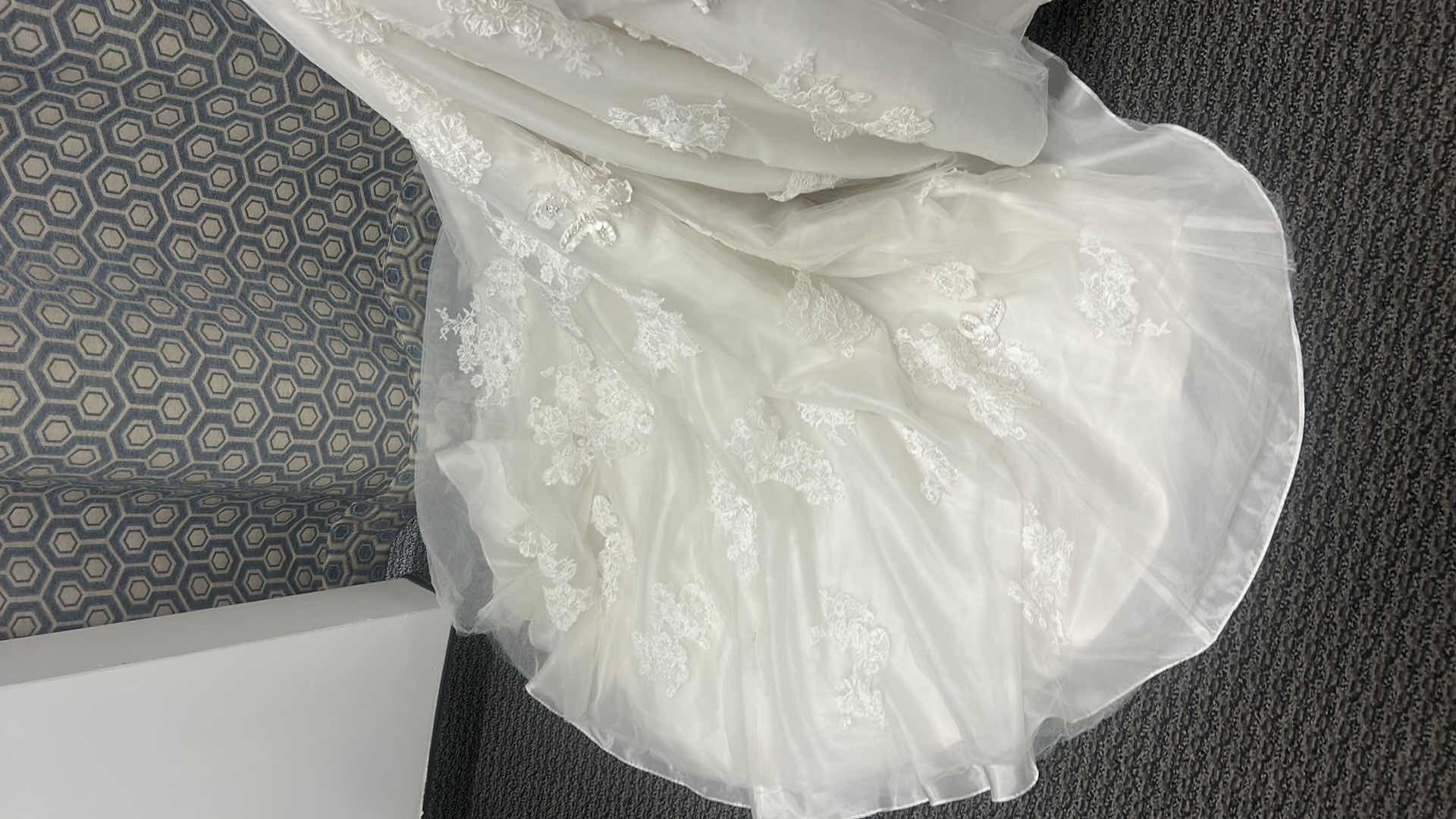 Photo 1 of BRIDAL GOWN “MAGGIE SOTTERO, IVORY ORGANZA AND TULLE WITH EMBELLISHED LACE, HANDMADE FLOWERS FEATURING LONG FULL TRAIN SIZE 8-10 