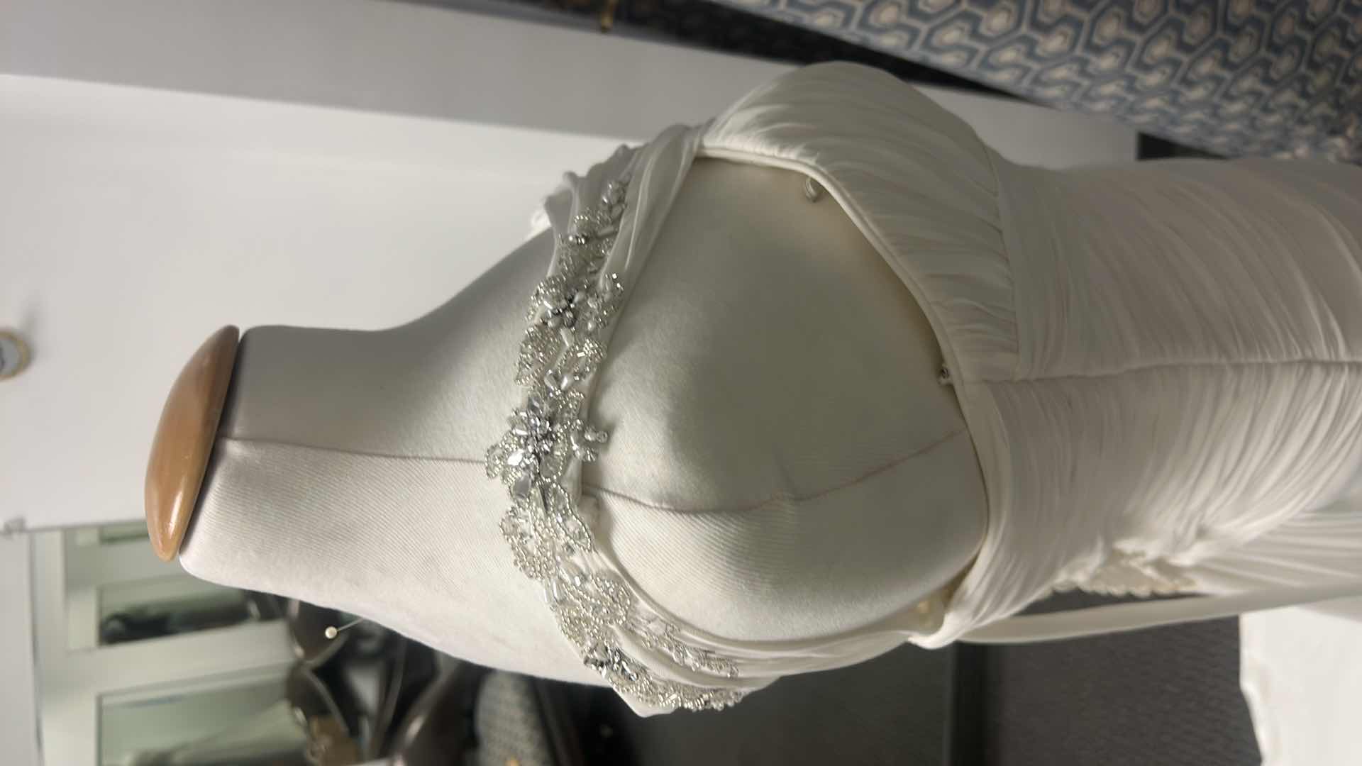 Photo 1 of NEW BRIDAL GOWN “SOTTERO AND MIDGLEY COUTURE”  WHITE ONE SHOULDER WEDDING DRESS WITH DIAGONAL RUCHING ACROSS THE BODICE, SUBTLE SIDE EMBELLISHMENT SIZE 12 