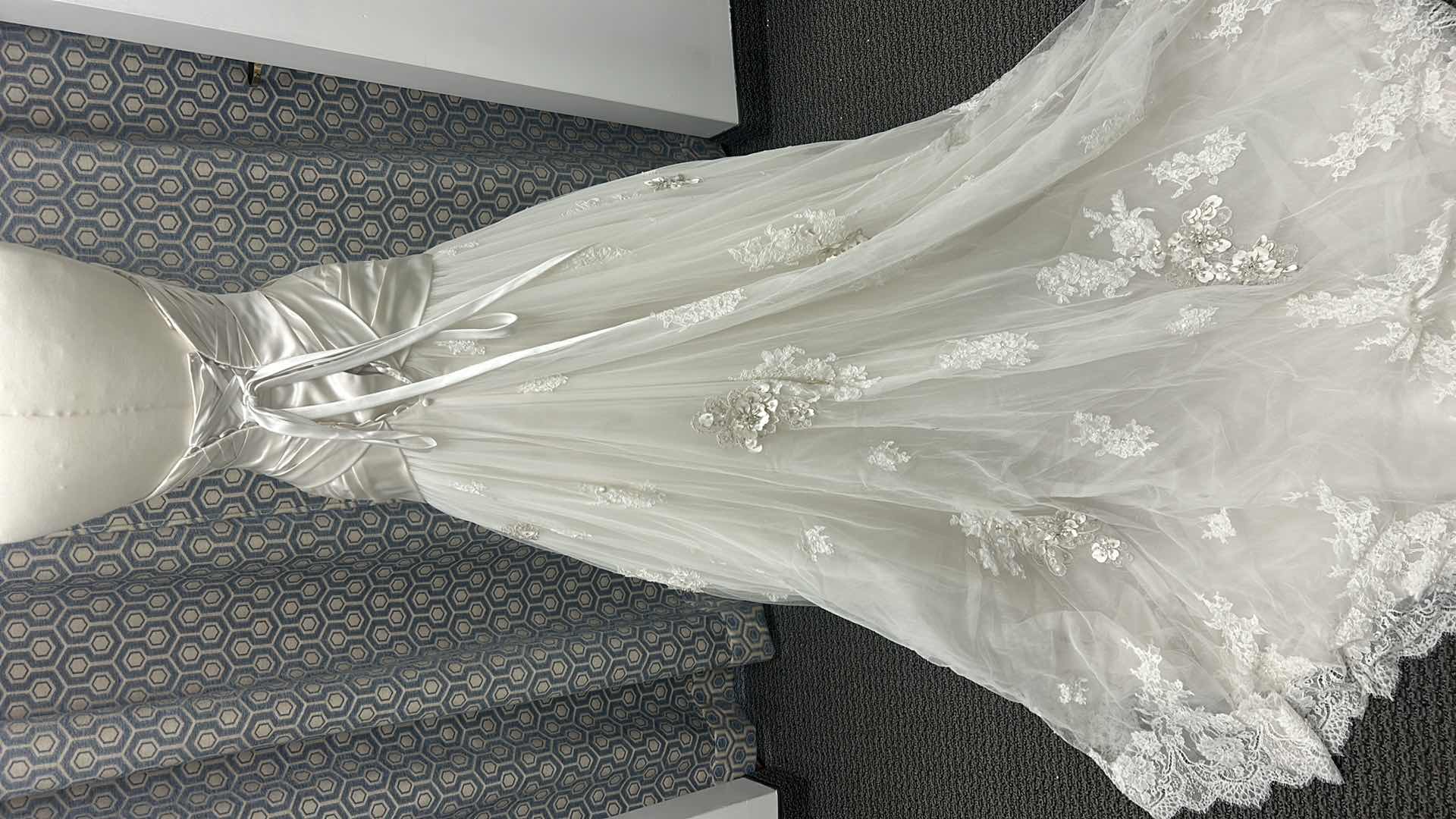 Photo 1 of BRIDAL GOWN “MAGGIE SOTTERO COUTURE”  ALABASTER IVORY LACE WITH PEWTER ACCENT SOFT SHIMMER SATIN FLOWERS FEATURING SWAROVSKI CRYSTALS SIZE 2,