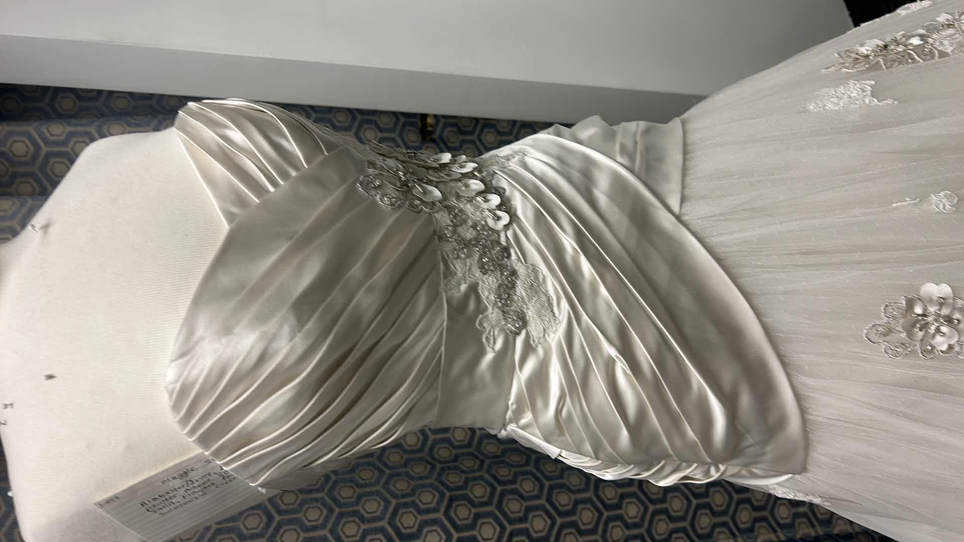 Photo 1 of BRIDAL GOWN “MAGGIE SOTTERO COUTURE”  ALABASTER IVORY LACE WITH PEWTER ACCENT SOFT SHIMMER SATIN FLOWERS FEATURING SWAROVSKI CRYSTALS SIZE 2,