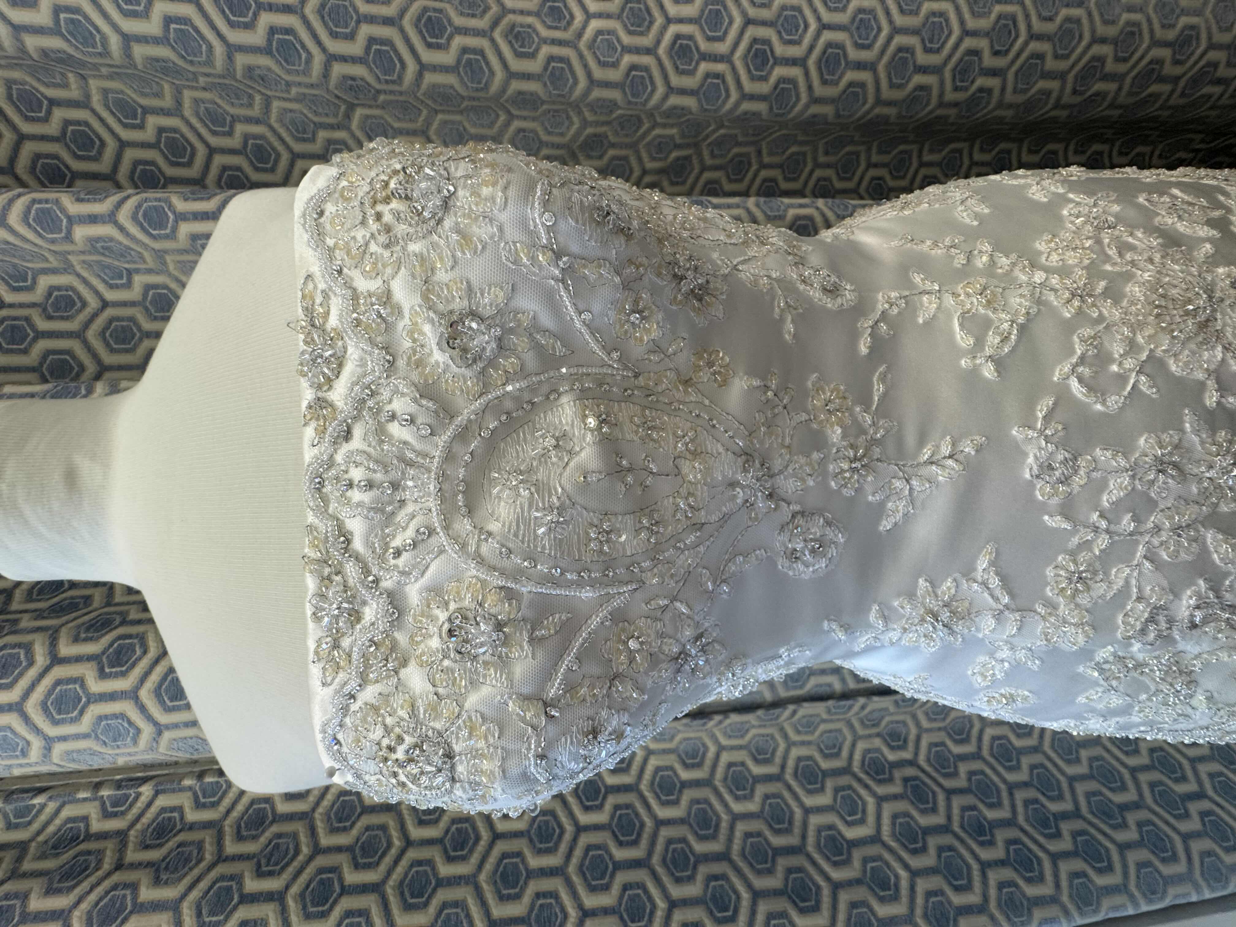 Photo 1 of BRIDAL GOWN PB SATIN BODICE WITH PEARL AND CRYSTAL DETAIL OPTIONAL SPAGHETTI STRAPS FULL ORGANZA OVER SATIN SKIRT MEDIUM TRAIN IVORY SIZE 8