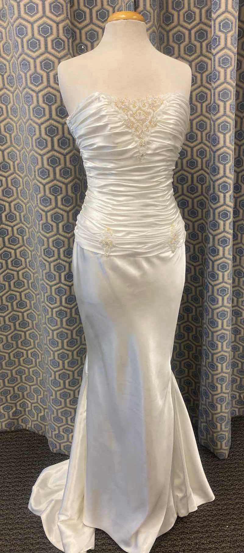 Photo 1 of BRIDAL GOWN “MAGGIE SOTTERO” IVORY SATIN STRAPLESS CORSET BACK w SILVER & GOLD BEADING SIZE 10