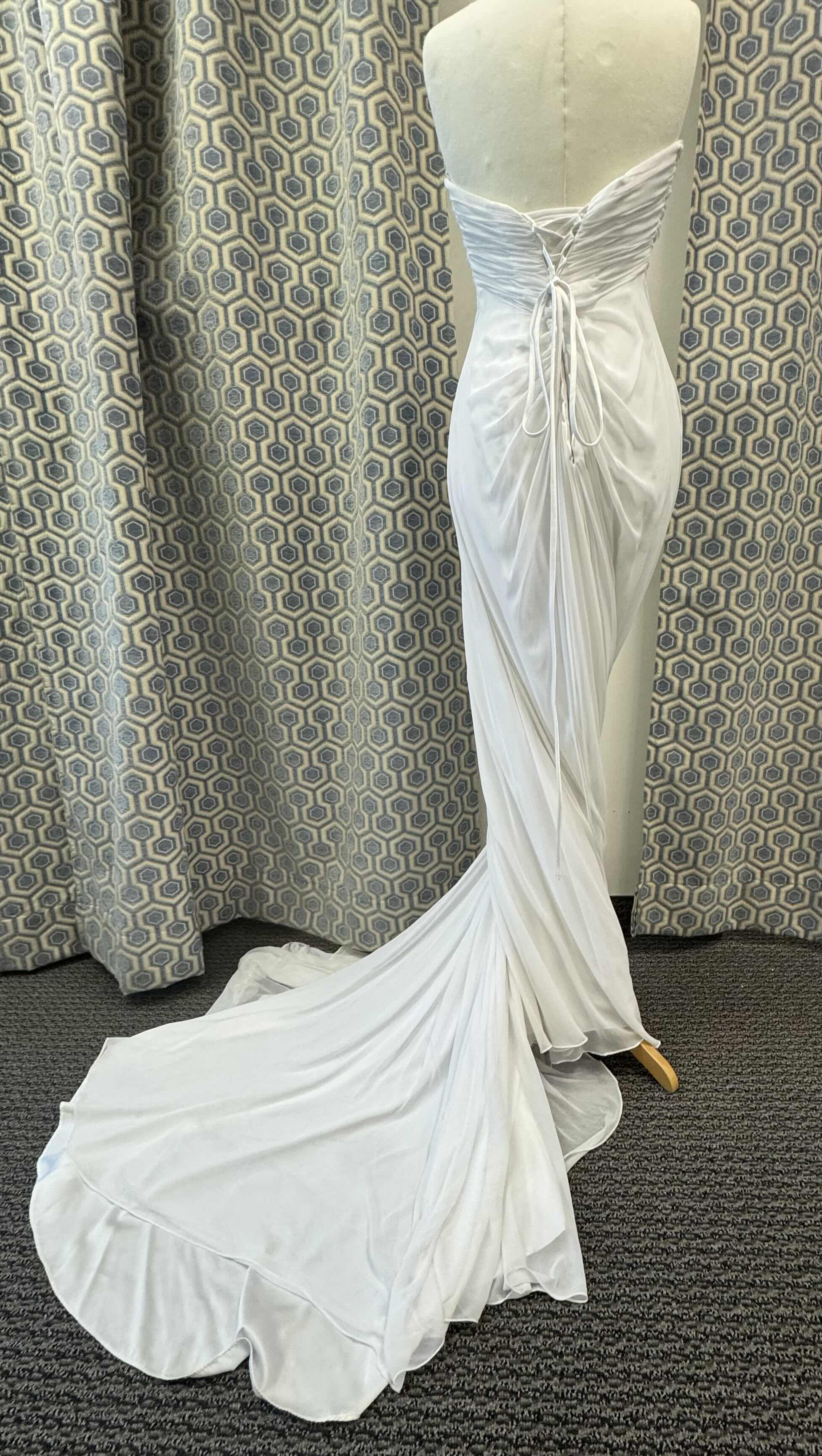 Photo 1 of BRIDAL GOWN MAGGIE SOTTERO GOSSAMER CHIFFON WITH HANDMADE FLOWERS OVER BEADED LACE EMBELLISHMENTS WHITE SIZE 10