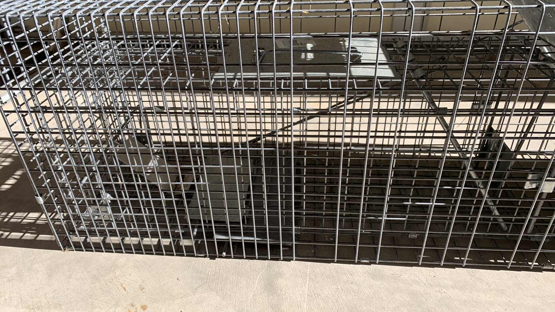 Photo 1 of 2-ANIMAL TRAP CAGES LARGEST IS 42” X 10” H 13”