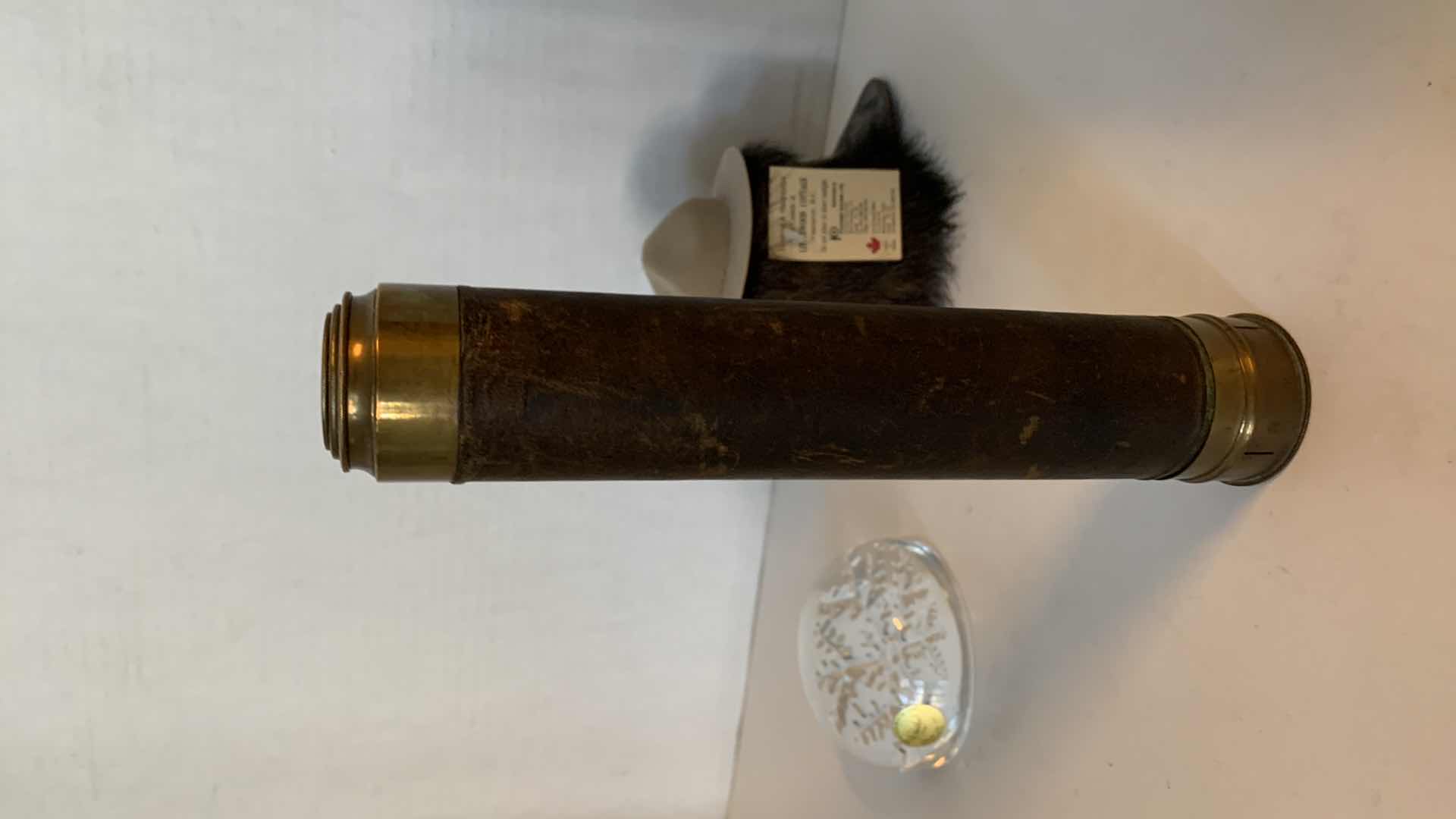 Photo 1 of ANTIQUE SPYGLASS, CANADIAN BEAR, AND A CRISTAL FRANCE LEADED SNOWFLAKE PAPERWEIGHT