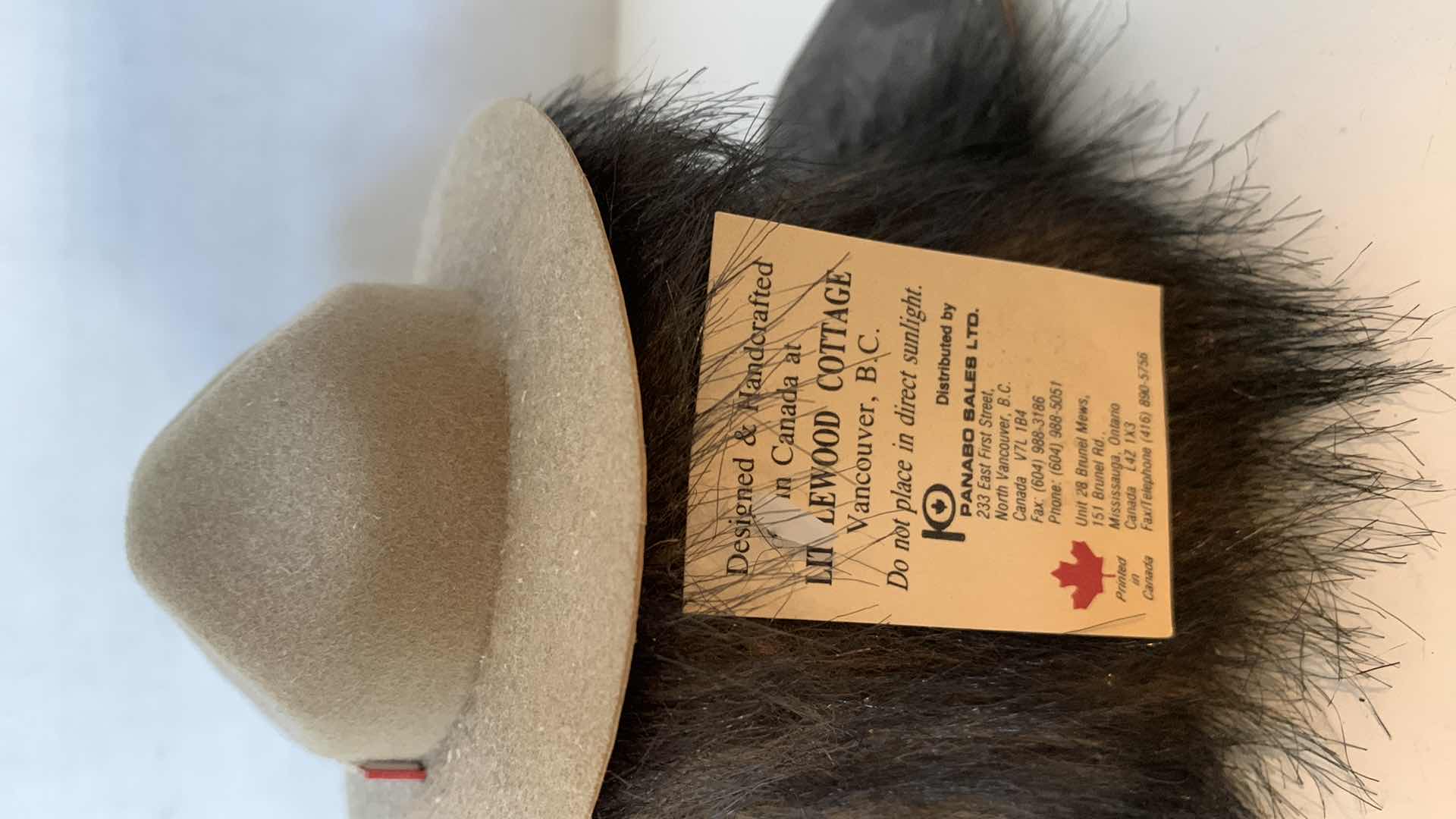 Photo 1 of ANTIQUE SPYGLASS, CANADIAN BEAR, AND A CRISTAL FRANCE LEADED SNOWFLAKE PAPERWEIGHT