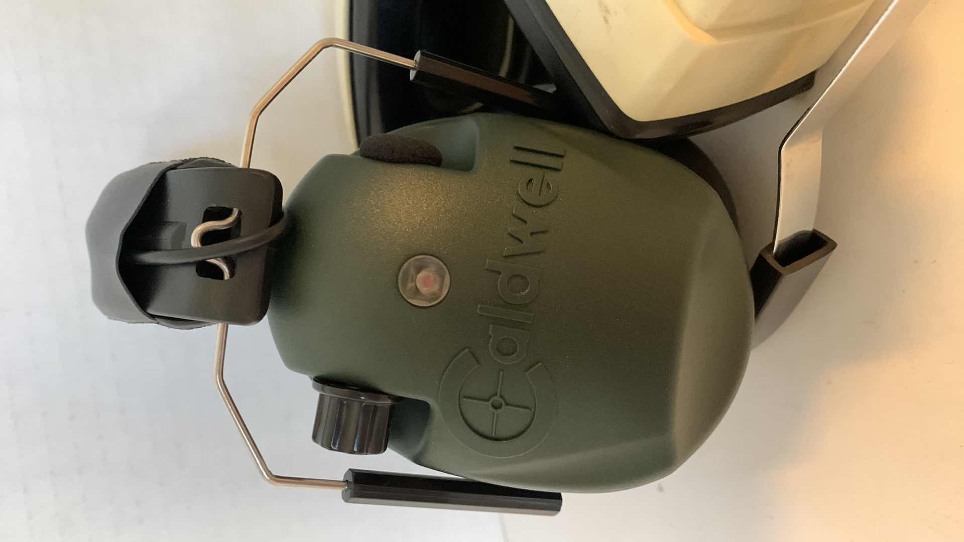 Photo 1 of 2- SHOOTING EAR PROTECTORS: CALDWELL AND GUN MUFFLER