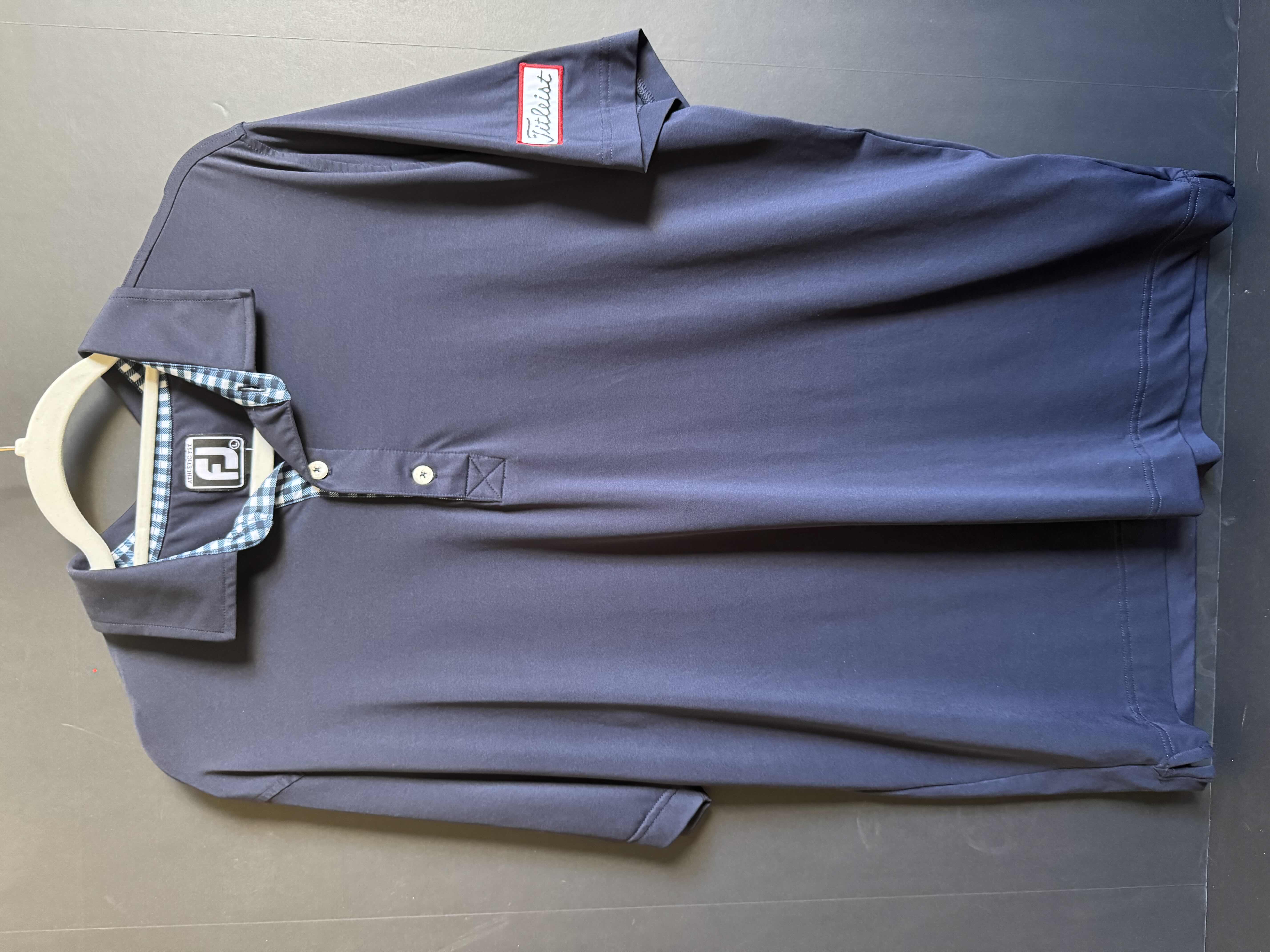 Photo 1 of FJ MENS SIZE LARGE PGA TOUR PATCHED POLO- ONLY FOR TOUR PROS AND NOT AVAILABLE TO THE PUBLIC