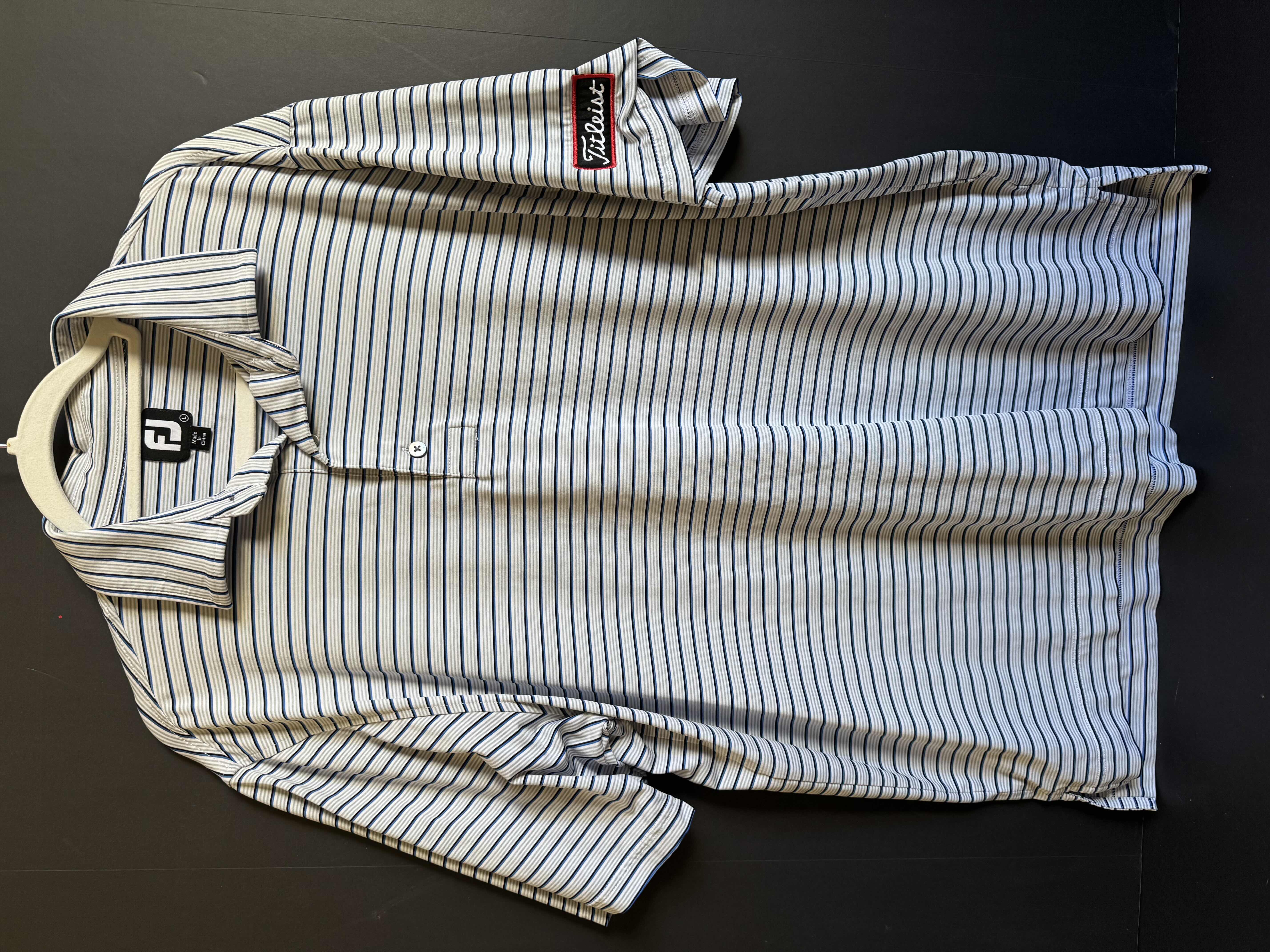 Photo 1 of FJ MENS SIZE LARGE PGA TOUR PATCHED POLO- ONLY FOR TOUR PROS AND NOT AVAILABLE TO THE PUBLIC