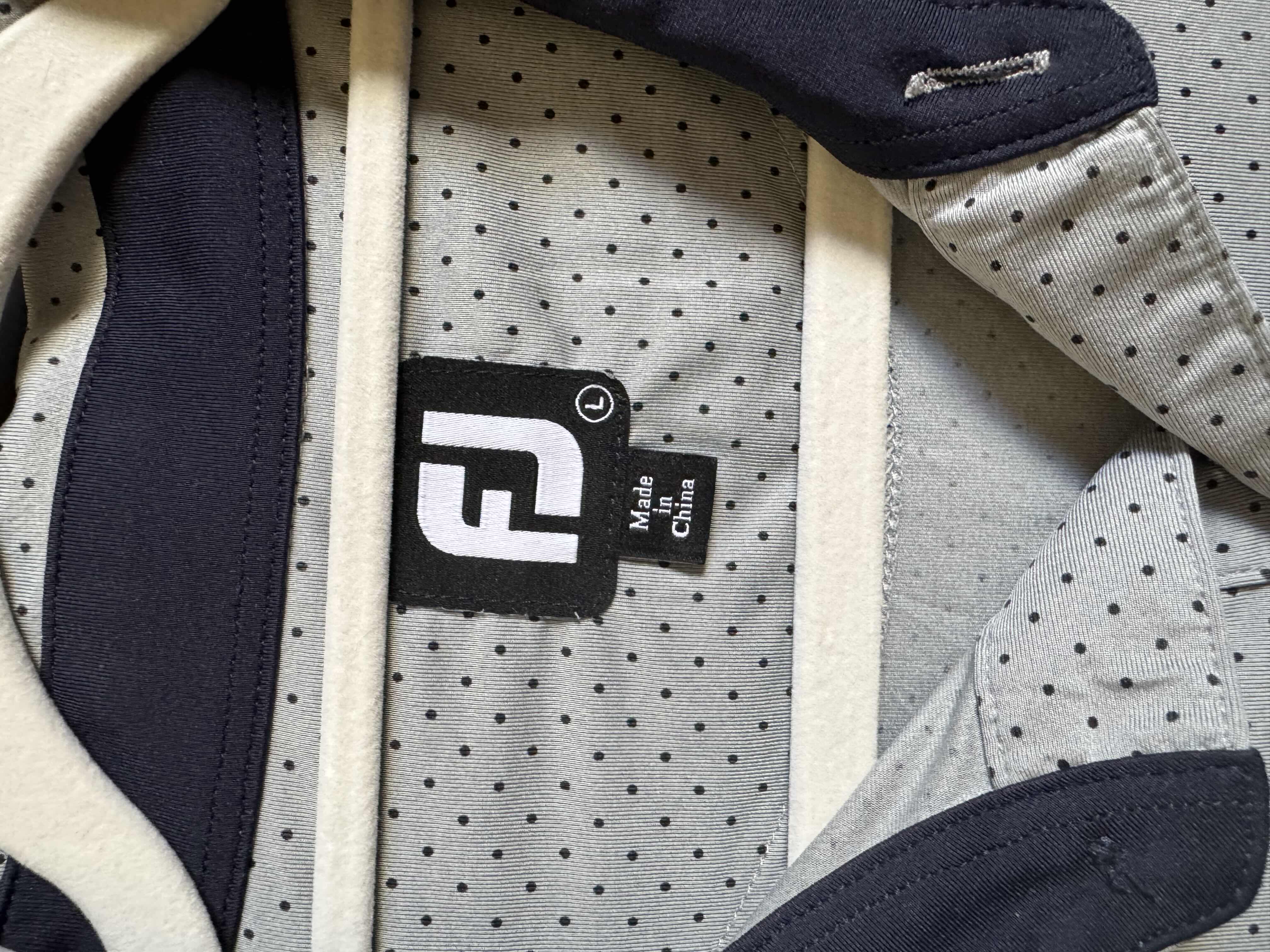 Photo 1 of FJ MENS SIZE LARGE PGA TOUR PATCHED POLO- ONLY FOR TOUR PROS AND NOT AVAILABLE TO THE PUBLIC