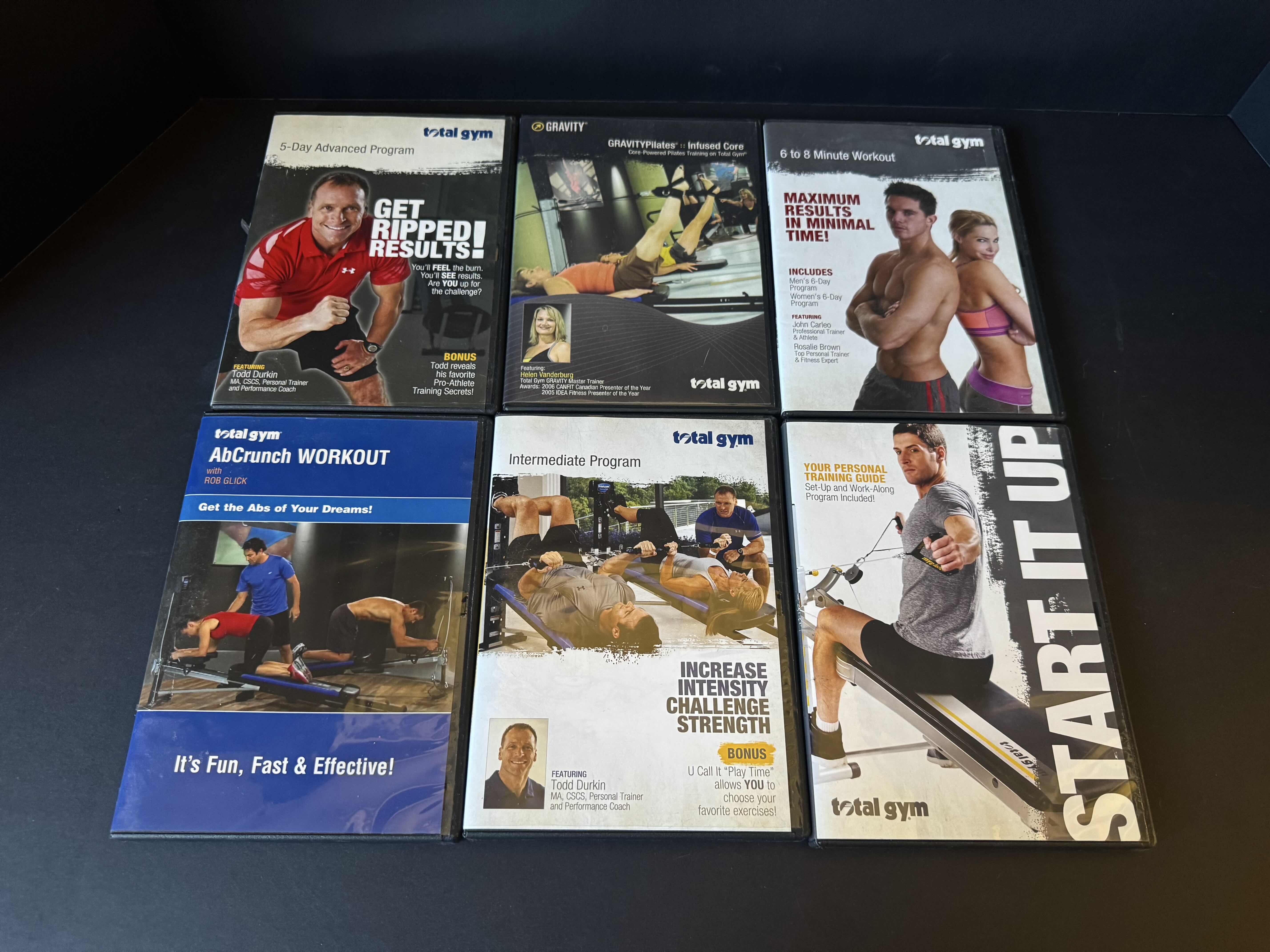 View 2 of ASSORTED EXERCISE ITEMS, RESISTANT BANDS, 6 TOTAL GYM DVD’S, TRAINING MANUAL, EXERCISE RESISTANCE BAND WITH HANDLES, WICKER BASKET.