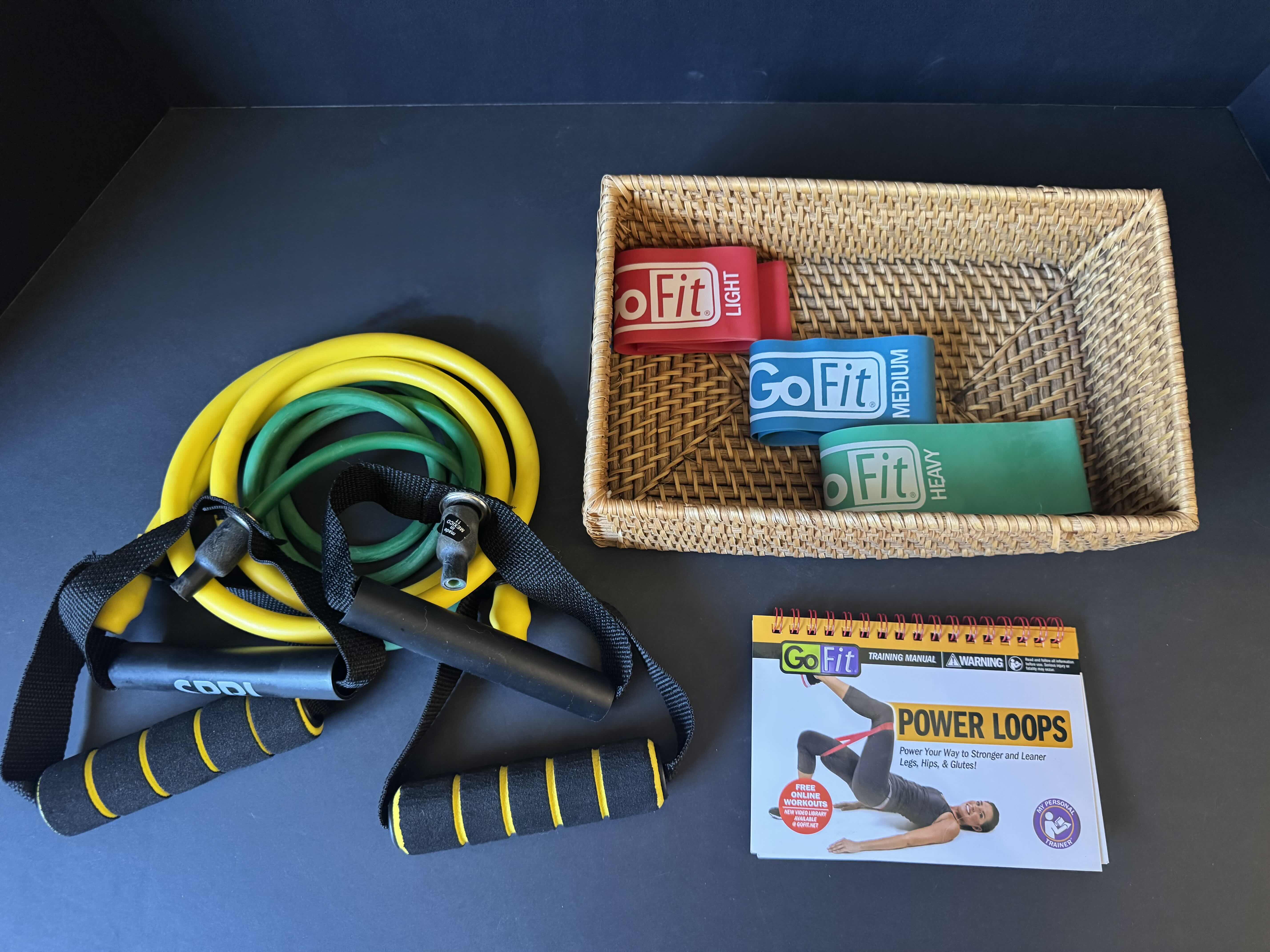 View 4 of ASSORTED EXERCISE ITEMS, RESISTANT BANDS, 6 TOTAL GYM DVD’S, TRAINING MANUAL, EXERCISE RESISTANCE BAND WITH HANDLES, WICKER BASKET.