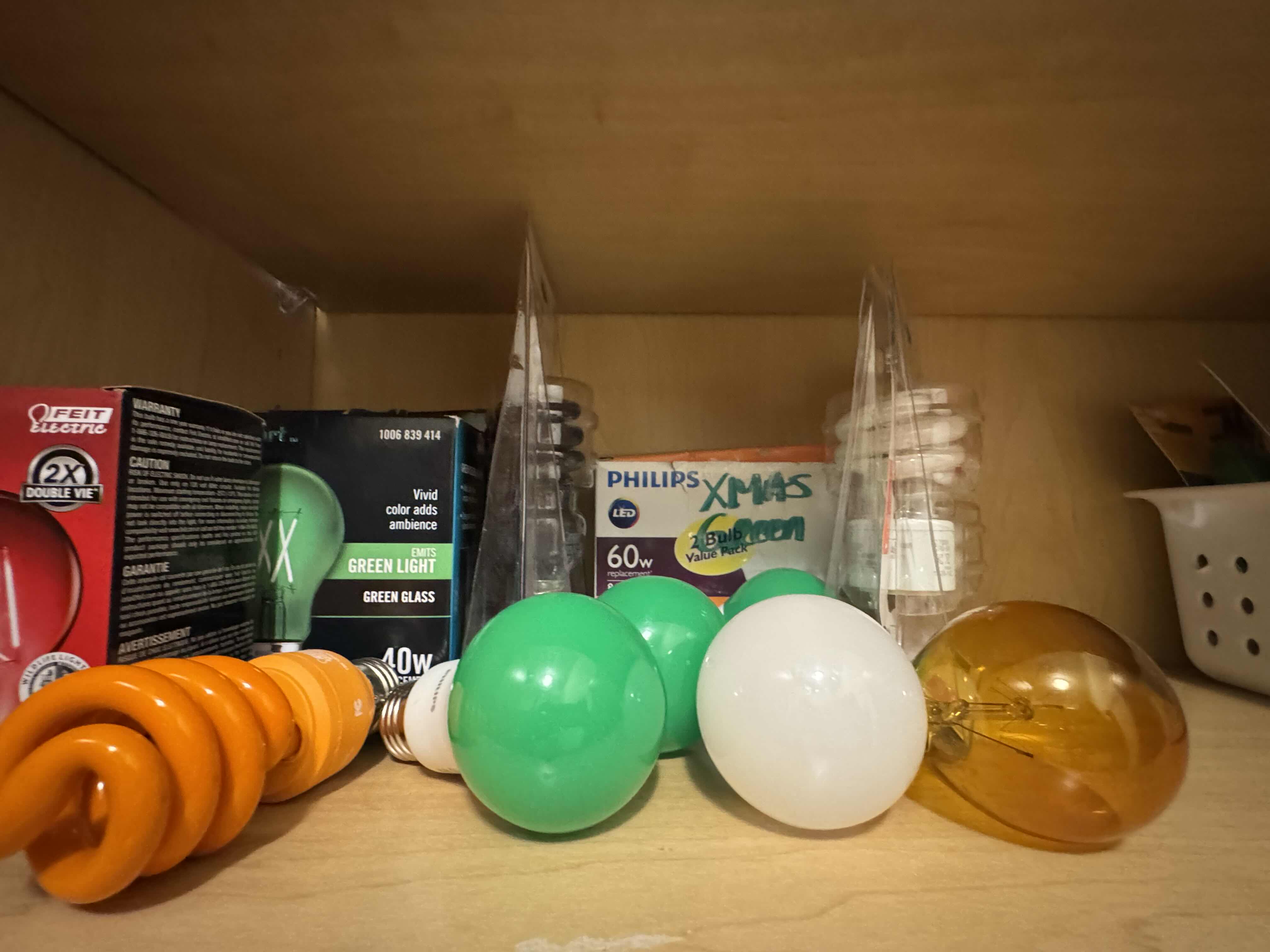 Photo 1 of CONTENTS OF SHELF-LIGHT BULBS AND COMMAND HOOKS