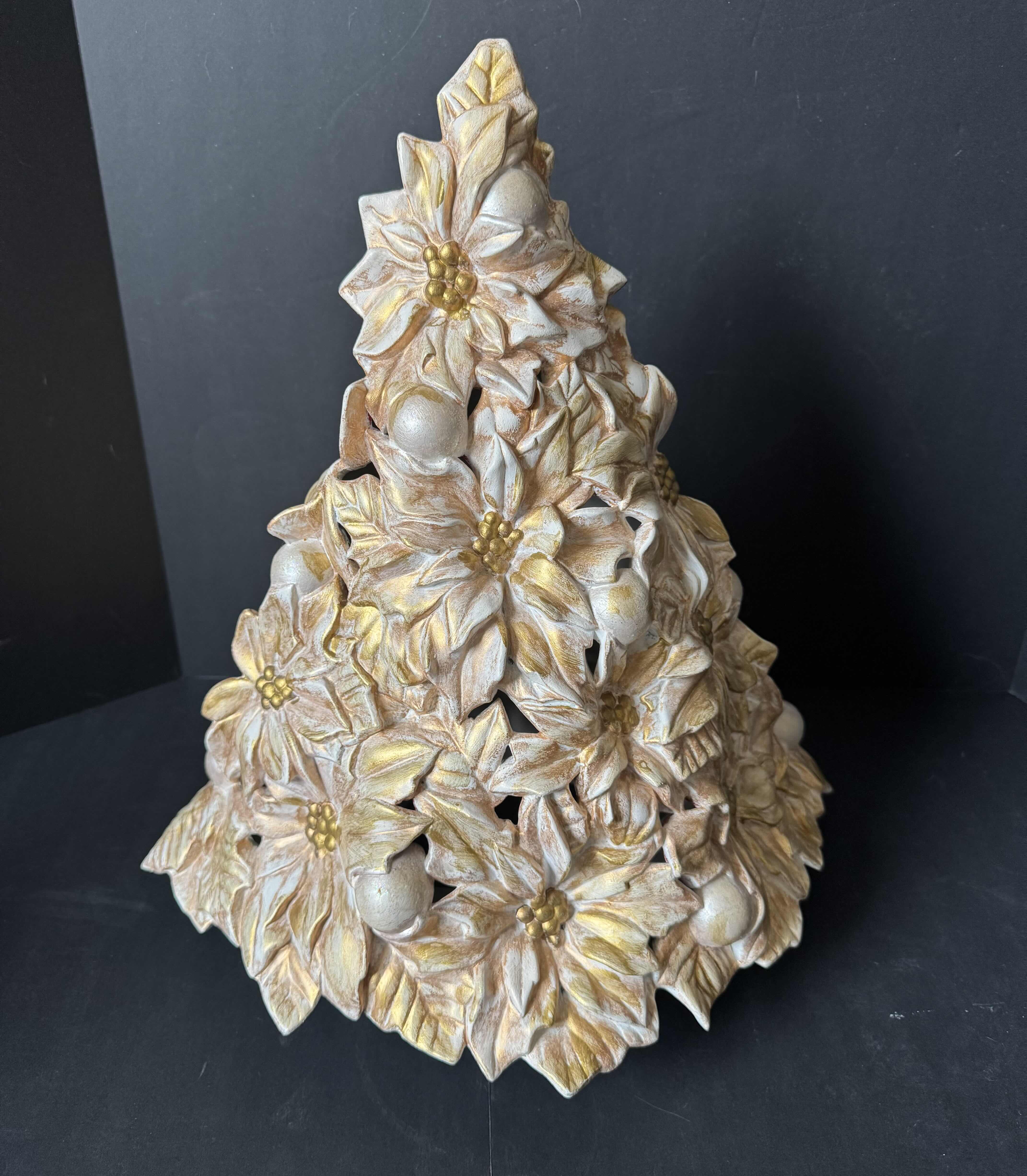 Photo 1 of ASSORTED HOLIDAY DECOR, CHRISTMAS DECOR, CERAMIC POINSETTIA CHRISTMAS TREE, 2 HANDSOAP, CANDLE, JINGLE BELLS, PAINT MARKER, ONE ROLL GLITTER TAPE