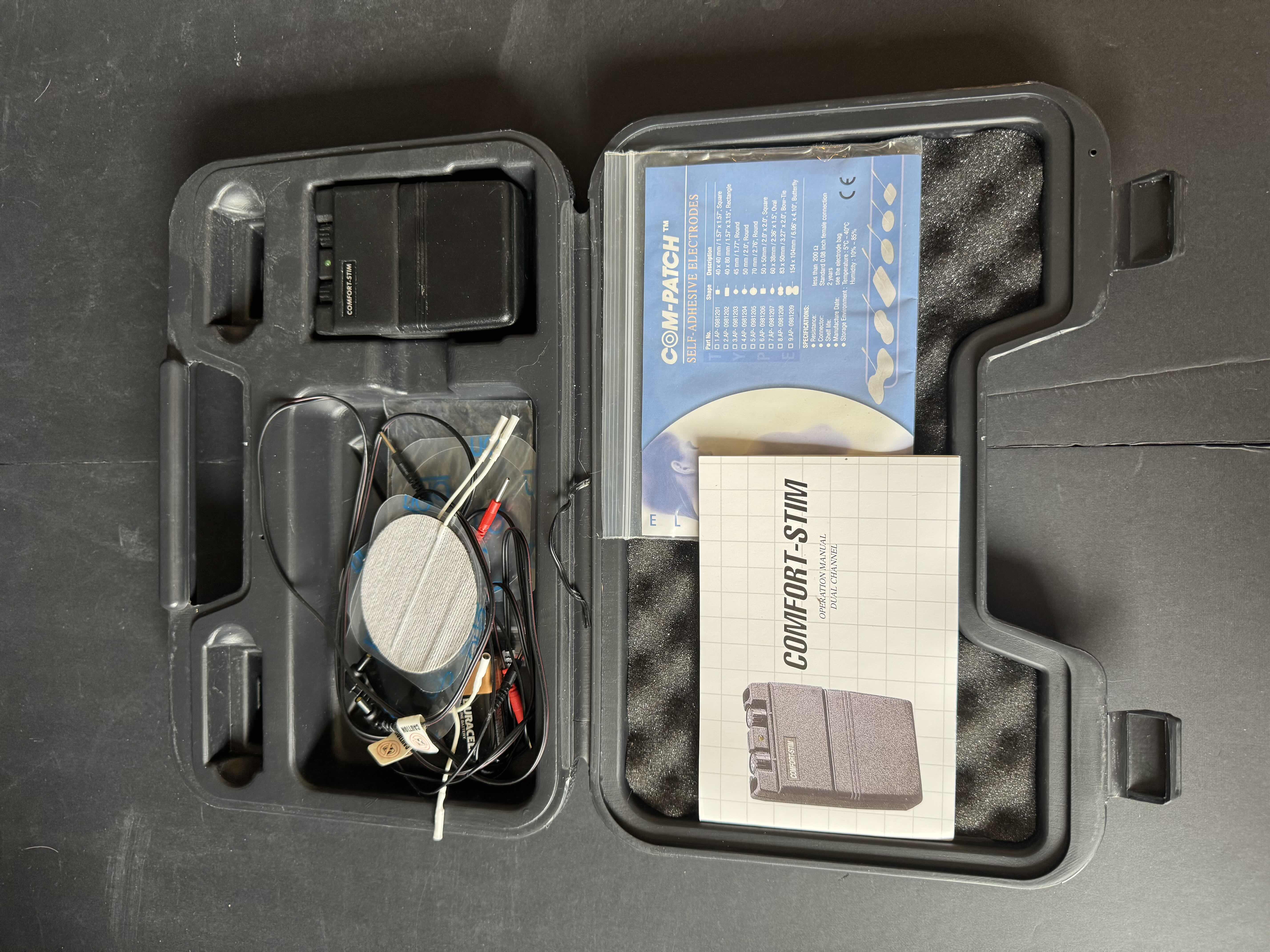 Photo 1 of COMFORT STIM TRANSCUTANEOUS ELECTRICAL NERVE STIMULATION AND BLOOD PRESSURE MONITOR, 2 ITEMS