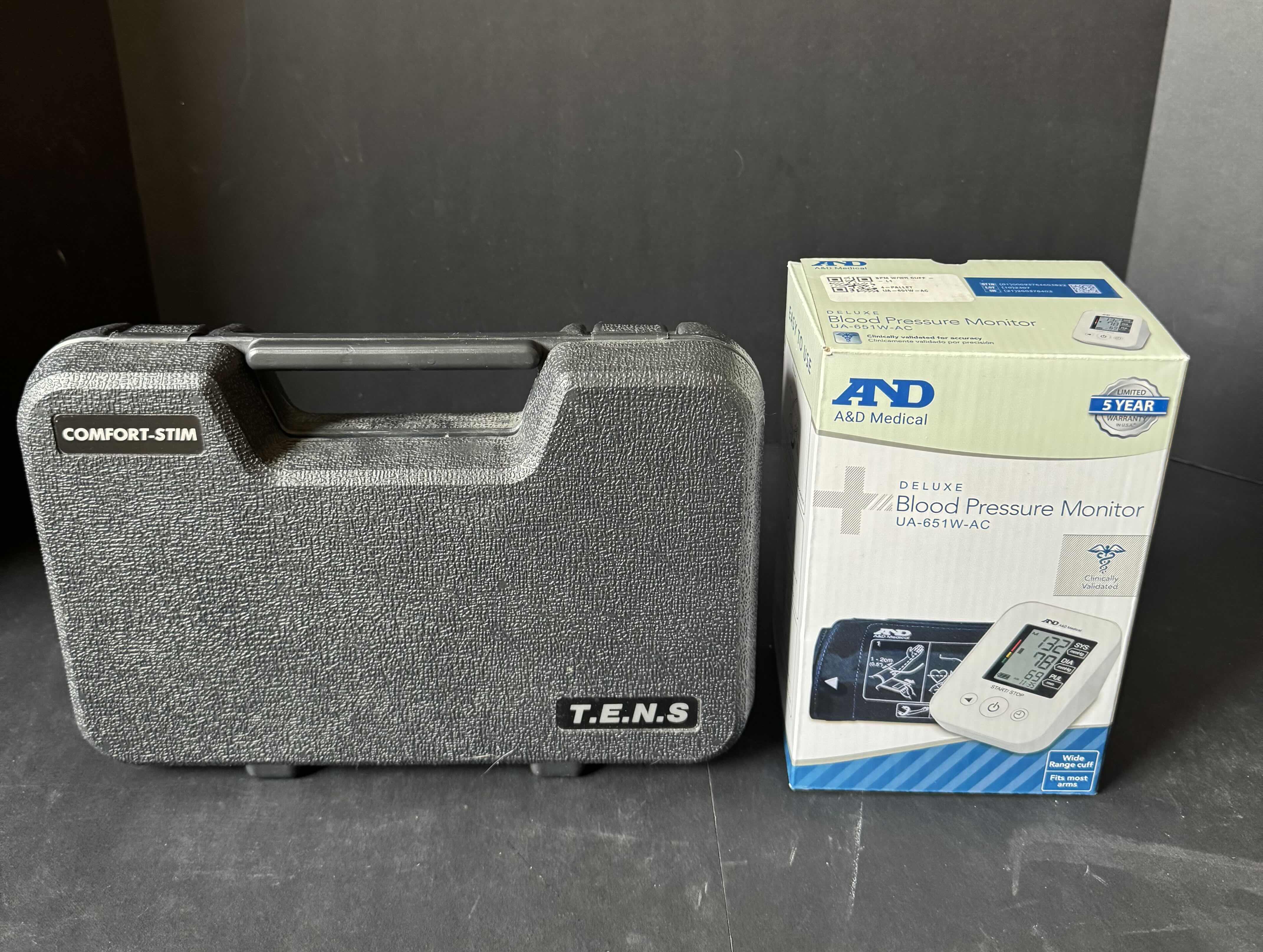 Photo 1 of COMFORT STIM TRANSCUTANEOUS ELECTRICAL NERVE STIMULATION AND BLOOD PRESSURE MONITOR, 2 ITEMS