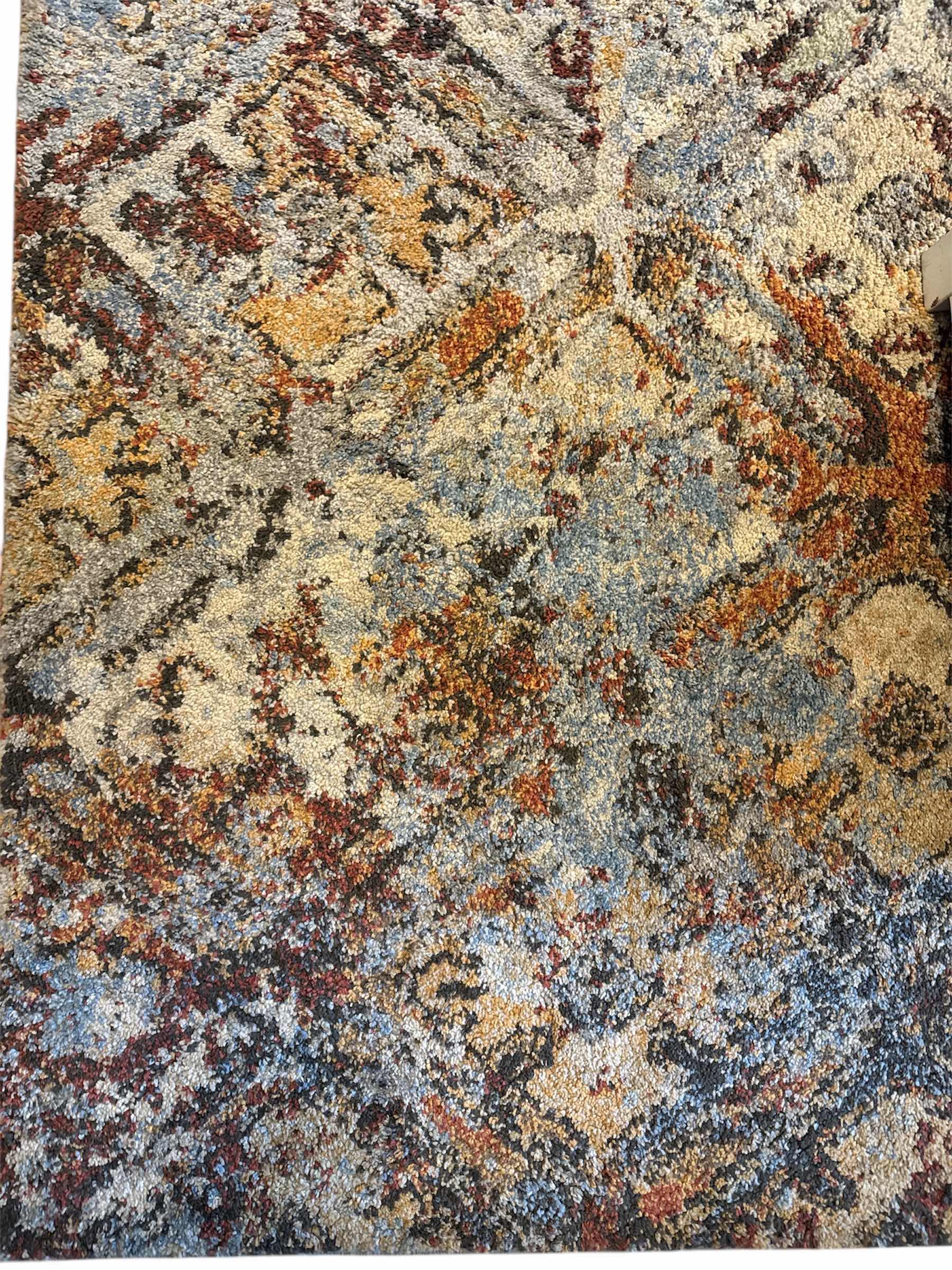 Photo 1 of 8’ X 11’ ABSTRACT AREA RUG