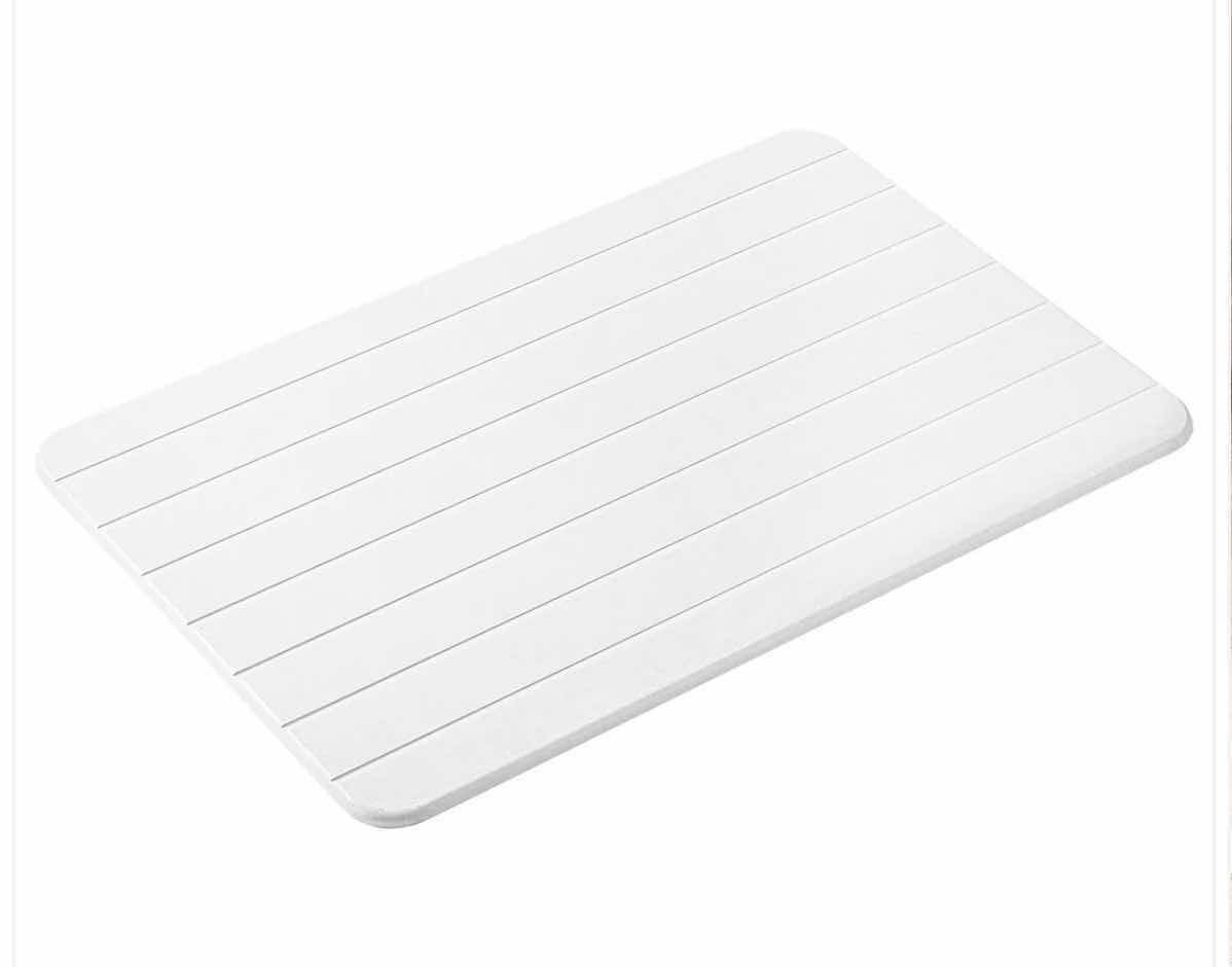 Photo 1 of BRAND NEW CASE OF 6 WHITE STONE BATH MATS