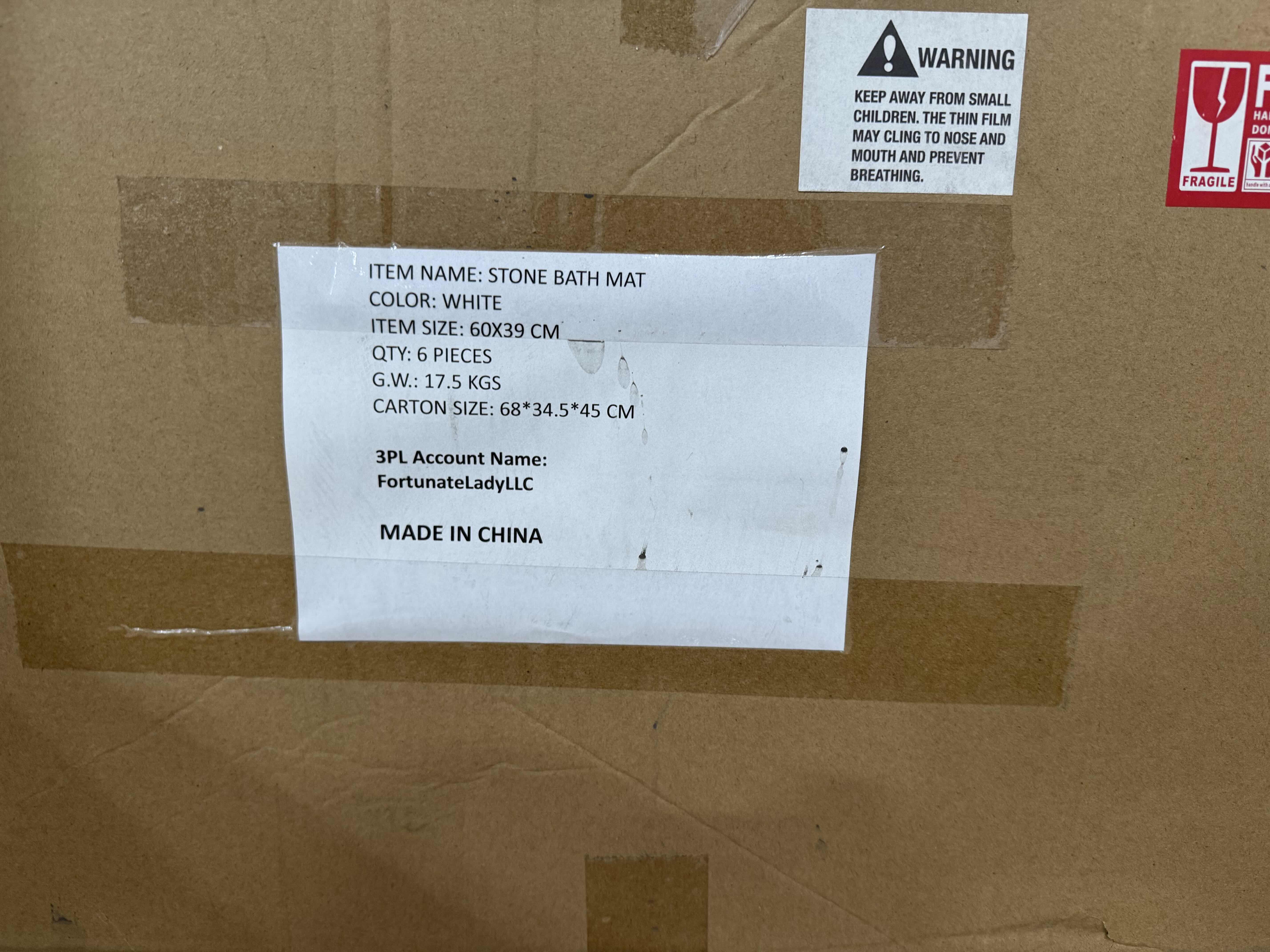 Photo 1 of BRAND NEW CASE OF 6 WHITE STONE BATH MATS