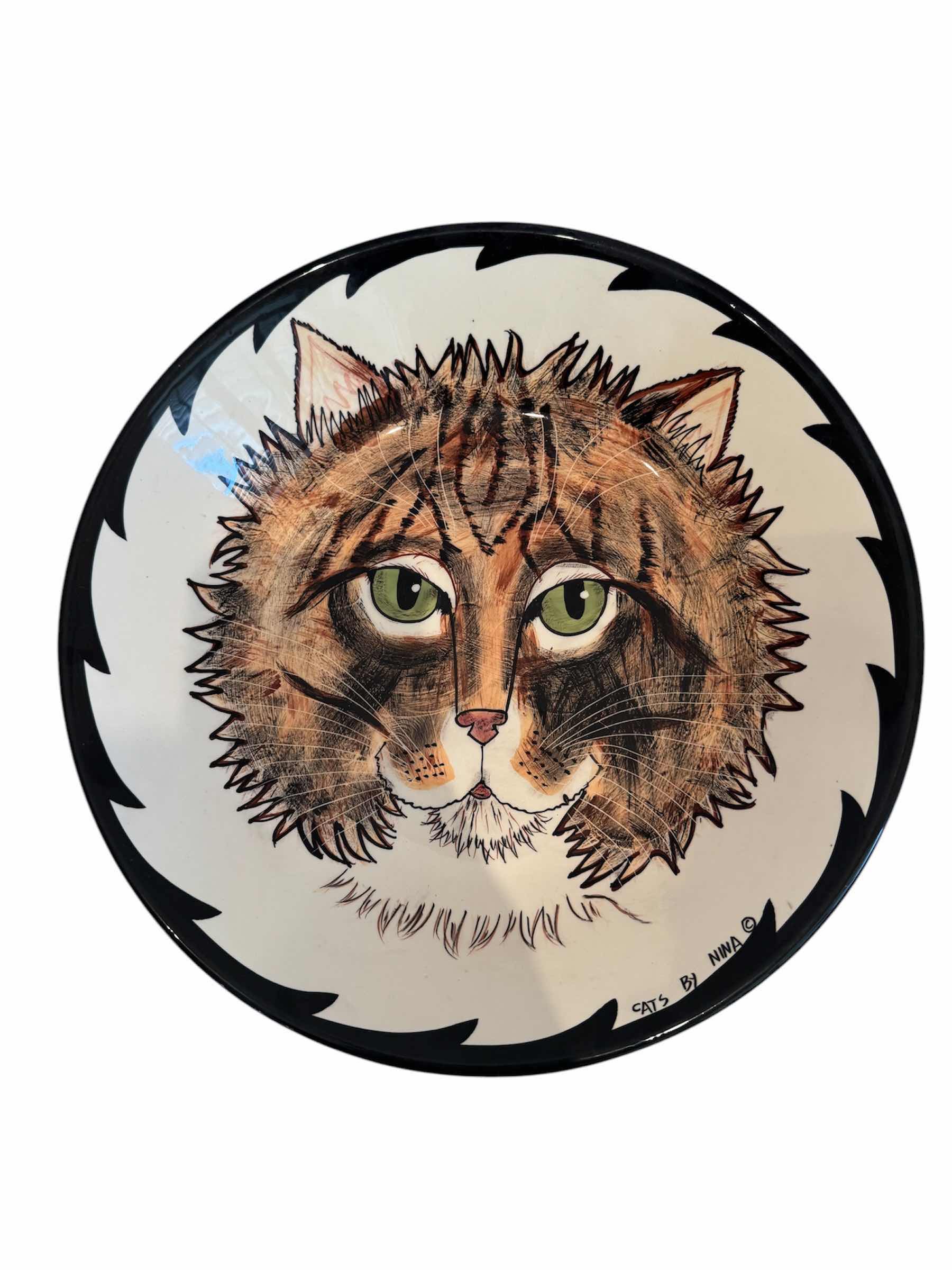 Photo 2 of CAT BOWLS BY NINA, CERAMIC BOWLS

12” X H2.5”