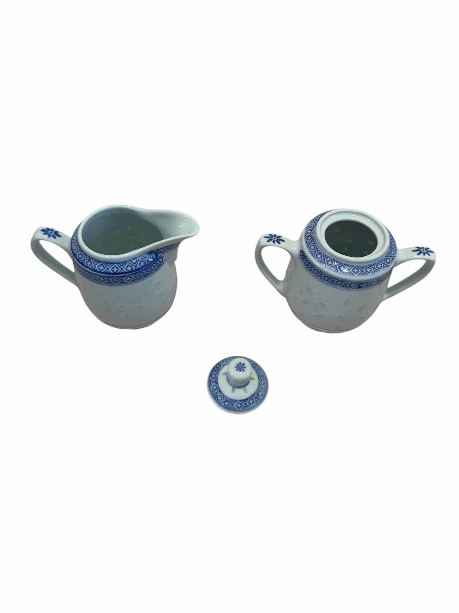 Photo 1 of VINTAGE CHINA BLUE AND WHITE RICE EYE TEAPOT SUGAR AND CREAMER BOWLS, 

TEAPOT - H5.25”,

SUGAR BOWL - H4.75”,

CREAMER - H3.5”