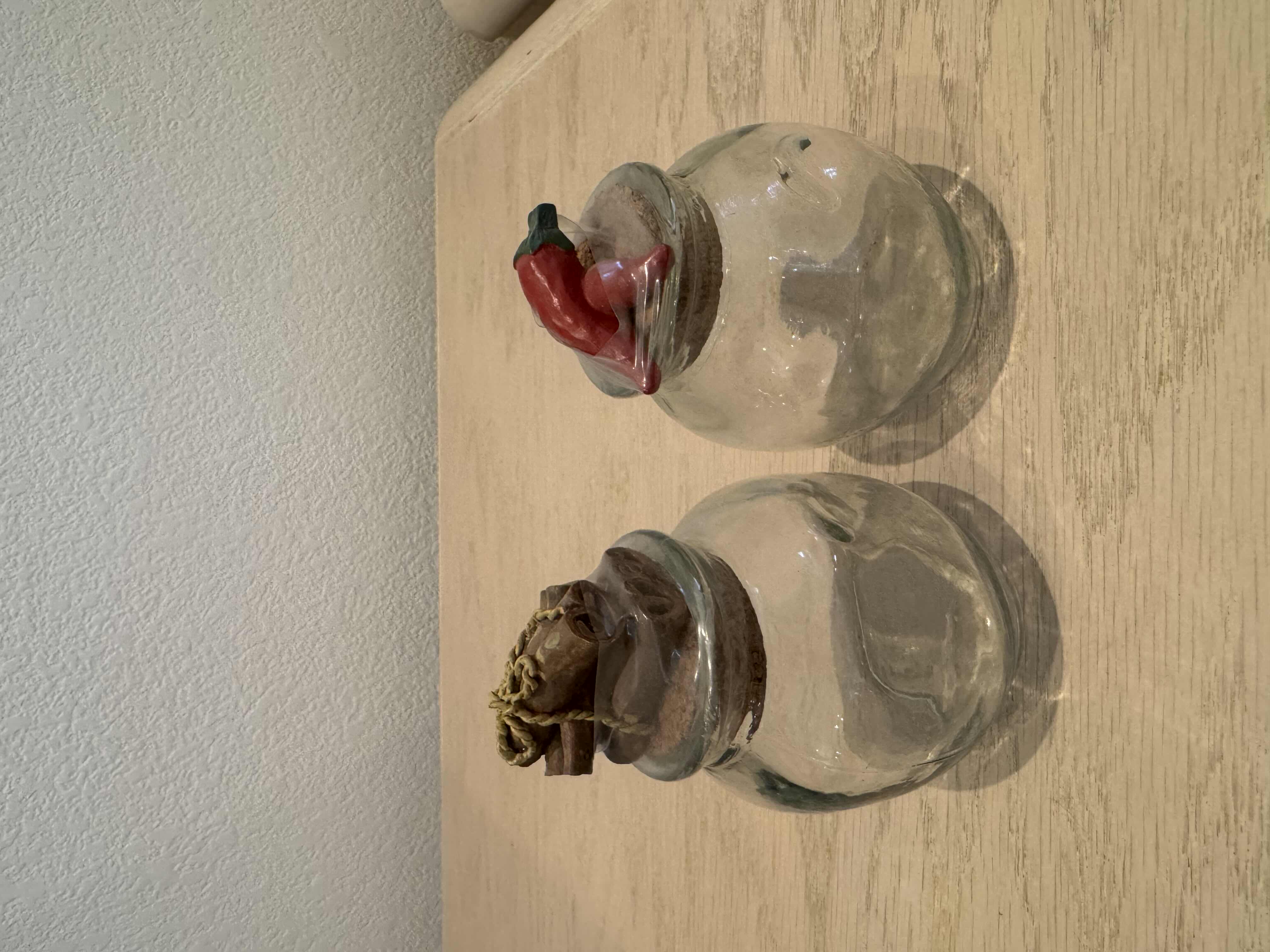 Photo 1 of VINTAGE ASSORTED GLASS SPICE JARS, 7 PIECES

H4”