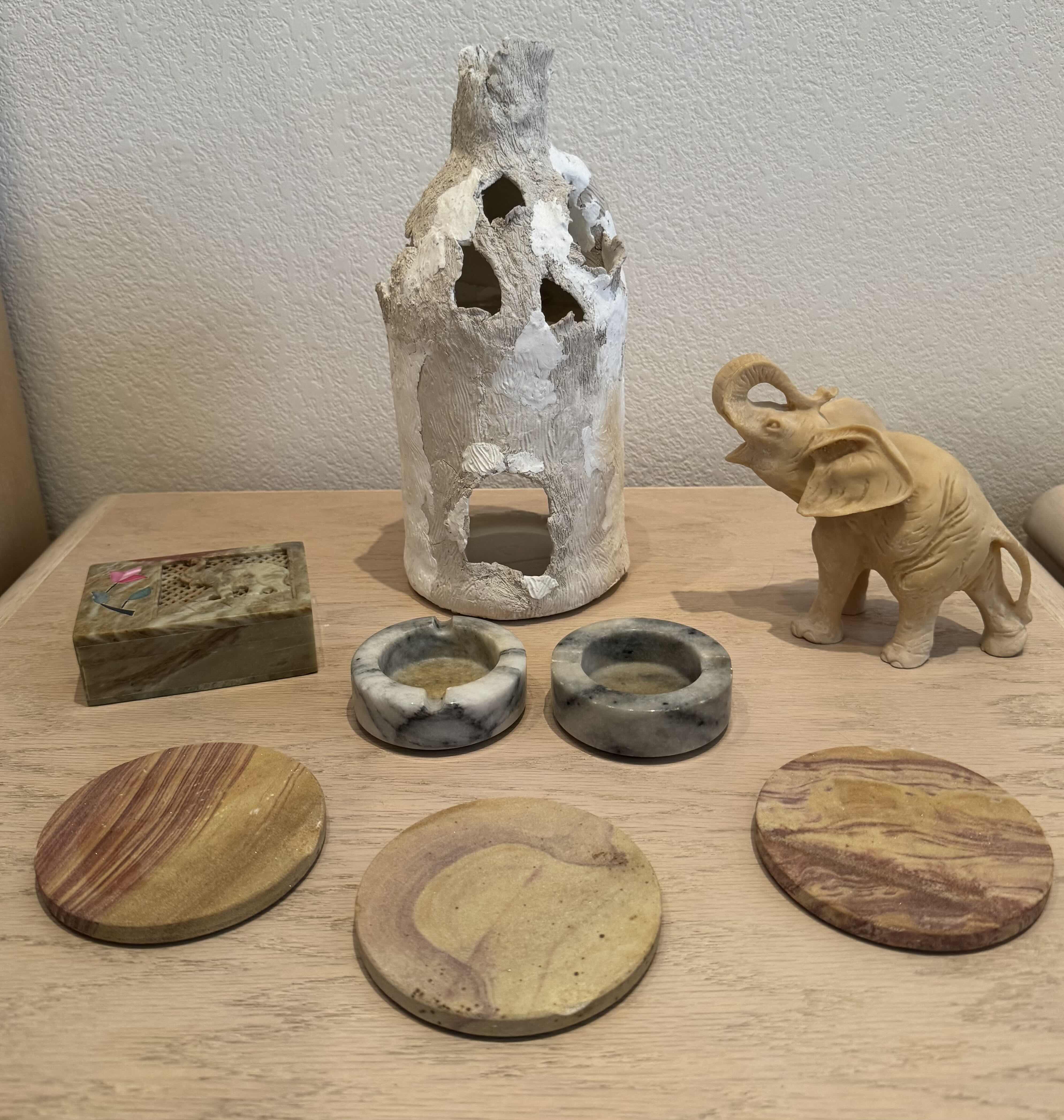 Photo 1 of ASSORTED HOME DECOR, HOME ESSENTIALS, ARTWORK, STONE ASHTRAYS, STONE COASTERS, STONE ELEPHANT JEWELRY BOX, ELEPHANT FIGURINE, HANDMADE VASE