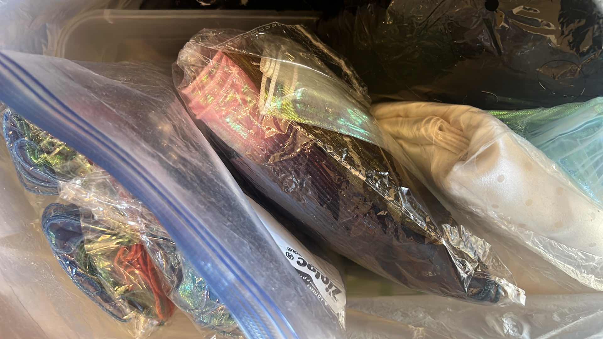 Photo 1 of CONTENTS OF BAG: MUTIPLES OF FABRICS ASSORTMENT OF COLORS