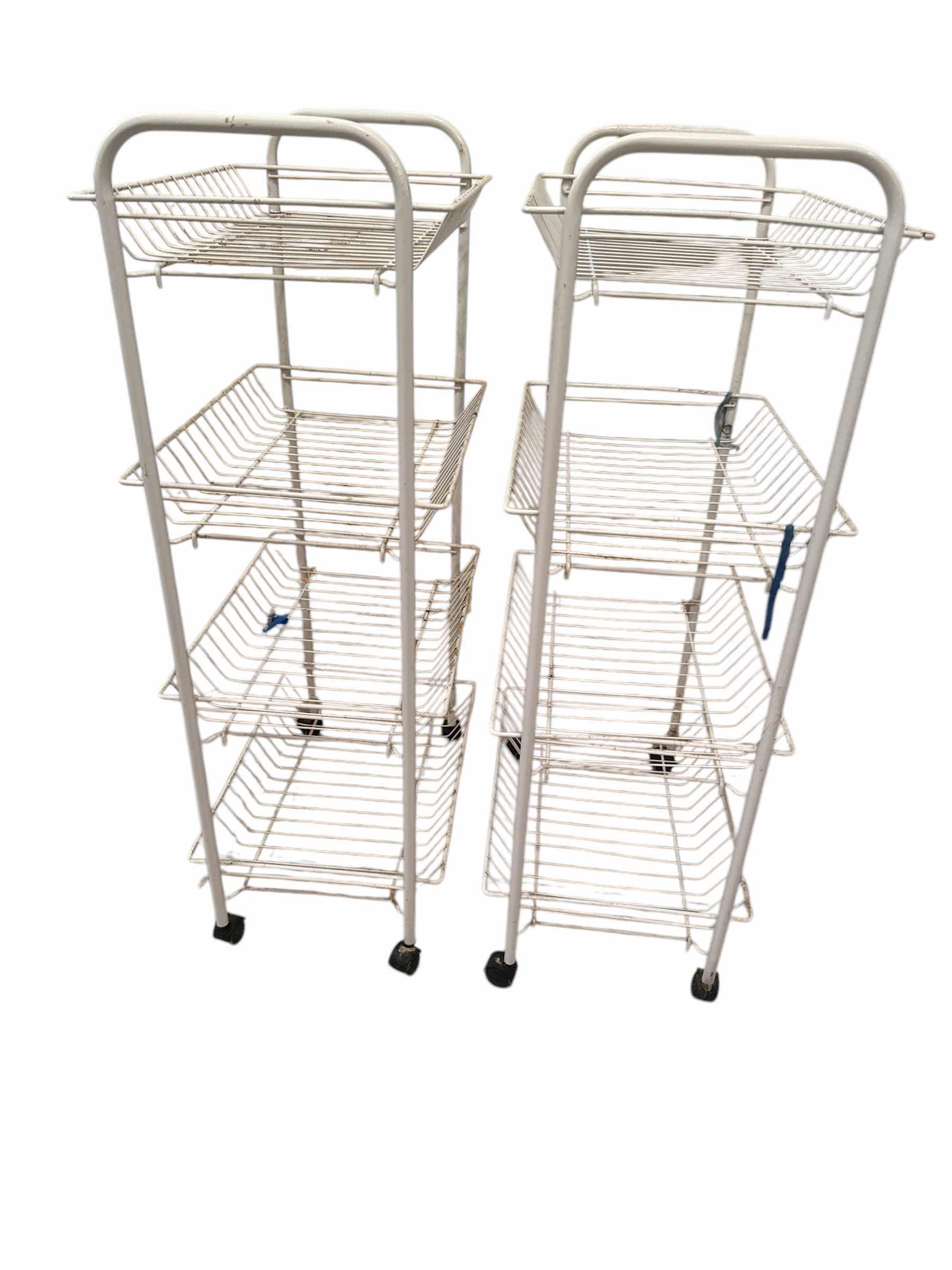 Photo 1 of 2 WHITE WIRE WHEELED CARTS
12“ x 17“ H 33”