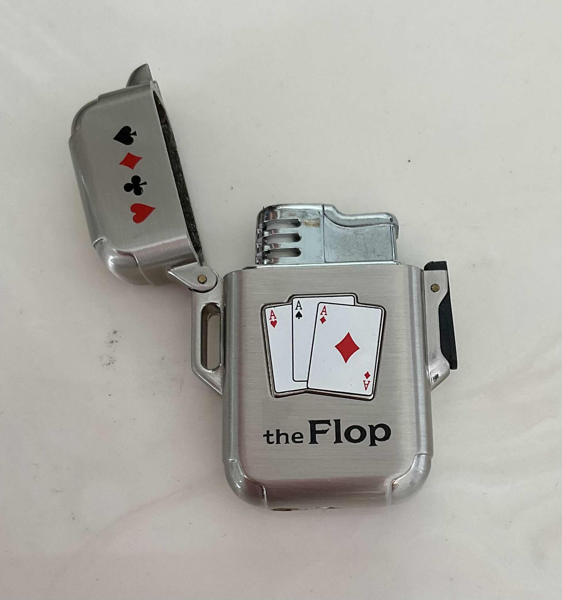 Photo 1 of ASSORTED LIGHTERS 2 TORCH LIGHTERS AND 1 STRIKE LIGHTER