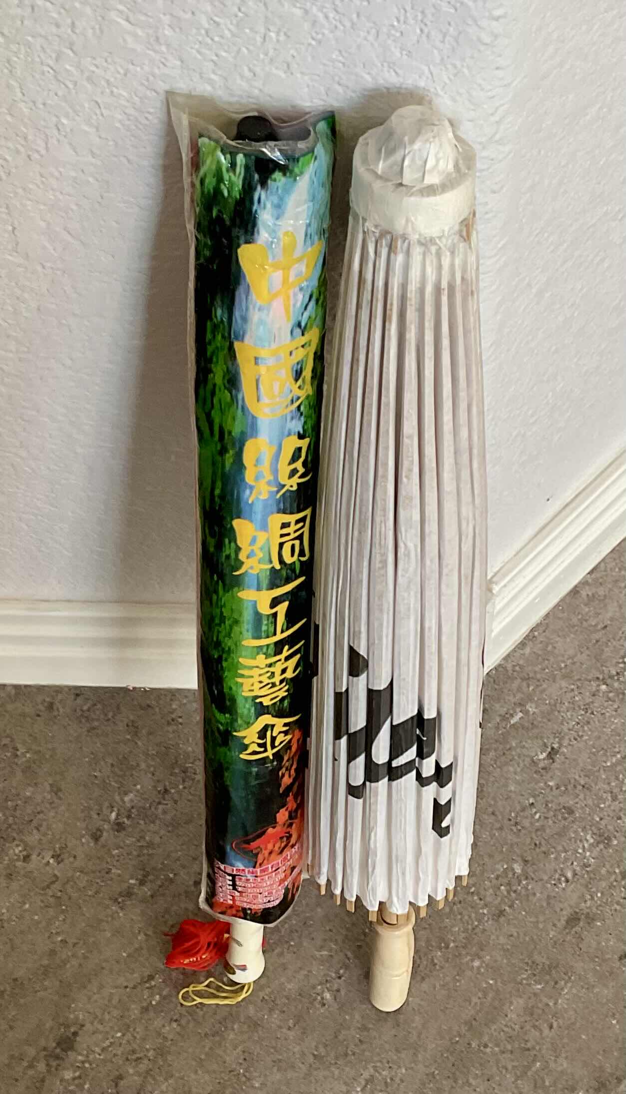 Photo 1 of 2 PAPER UMBRELLAS AND A SET OF 4 CLOTH HANGERS