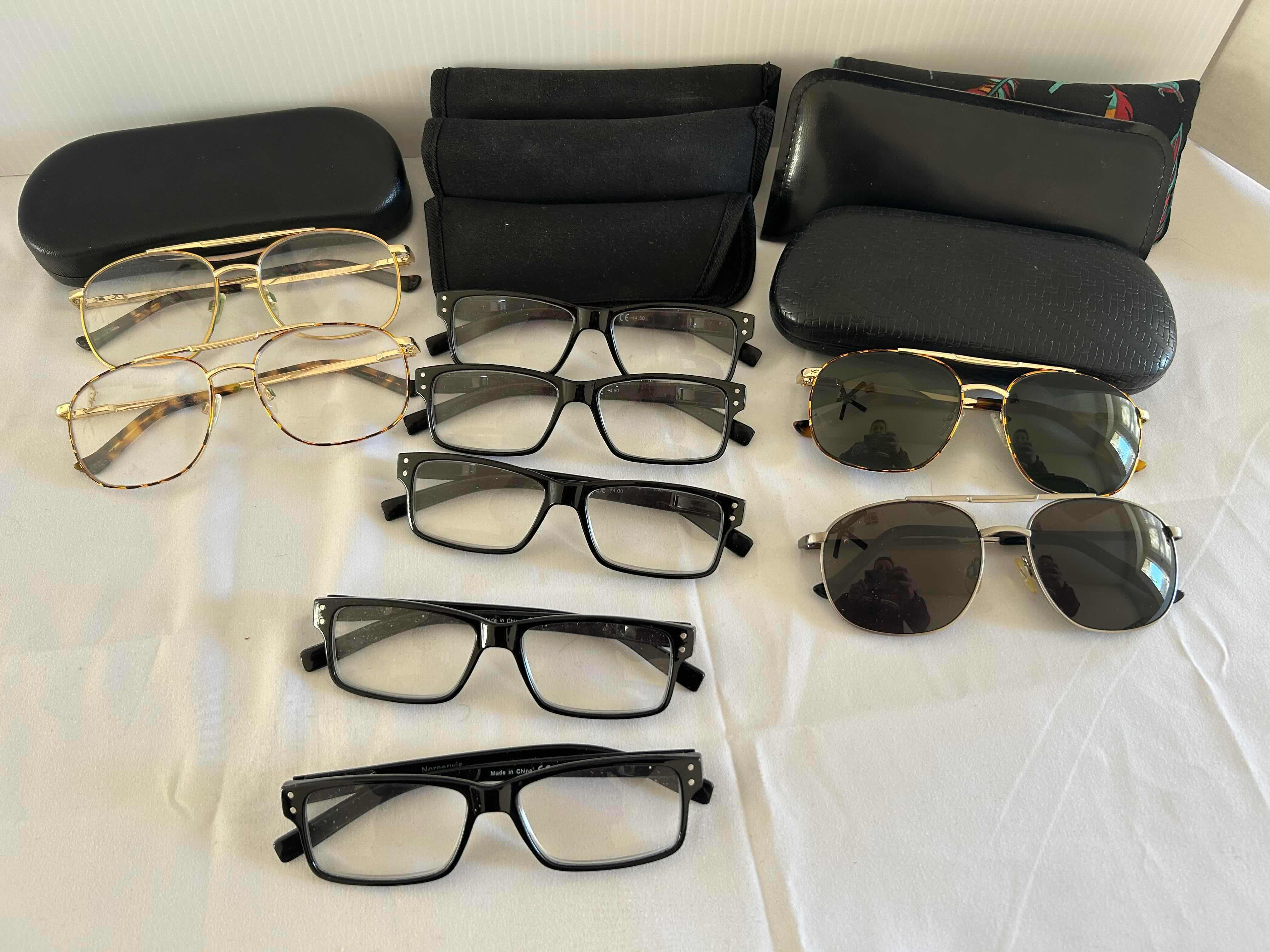 Photo 1 of 9-READING GLASSES AND SUNGLASSES VARIOUS FRAMES AND SHAPES. SOME WITH CASES.