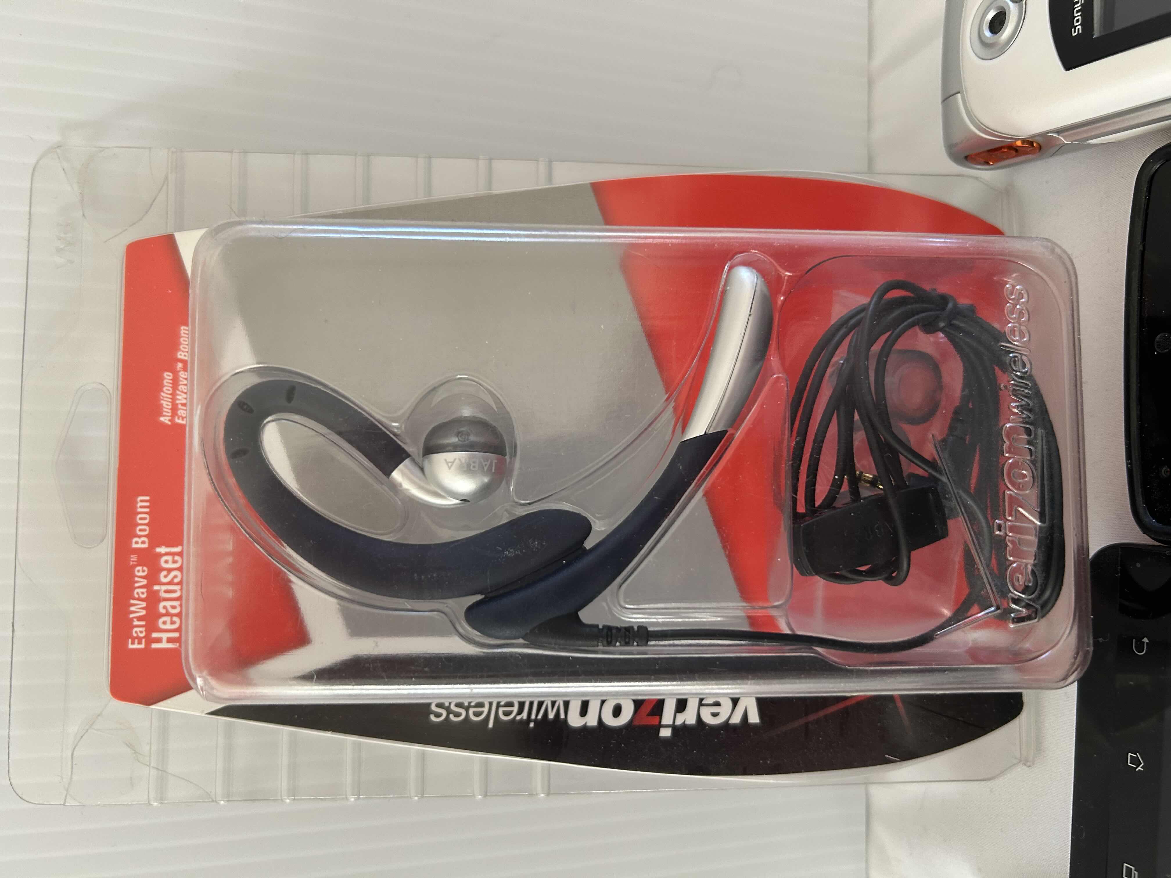 Photo 1 of 4 CELLULAR PHONES, BRAND NEW HEADSET AND CHARGING CORD