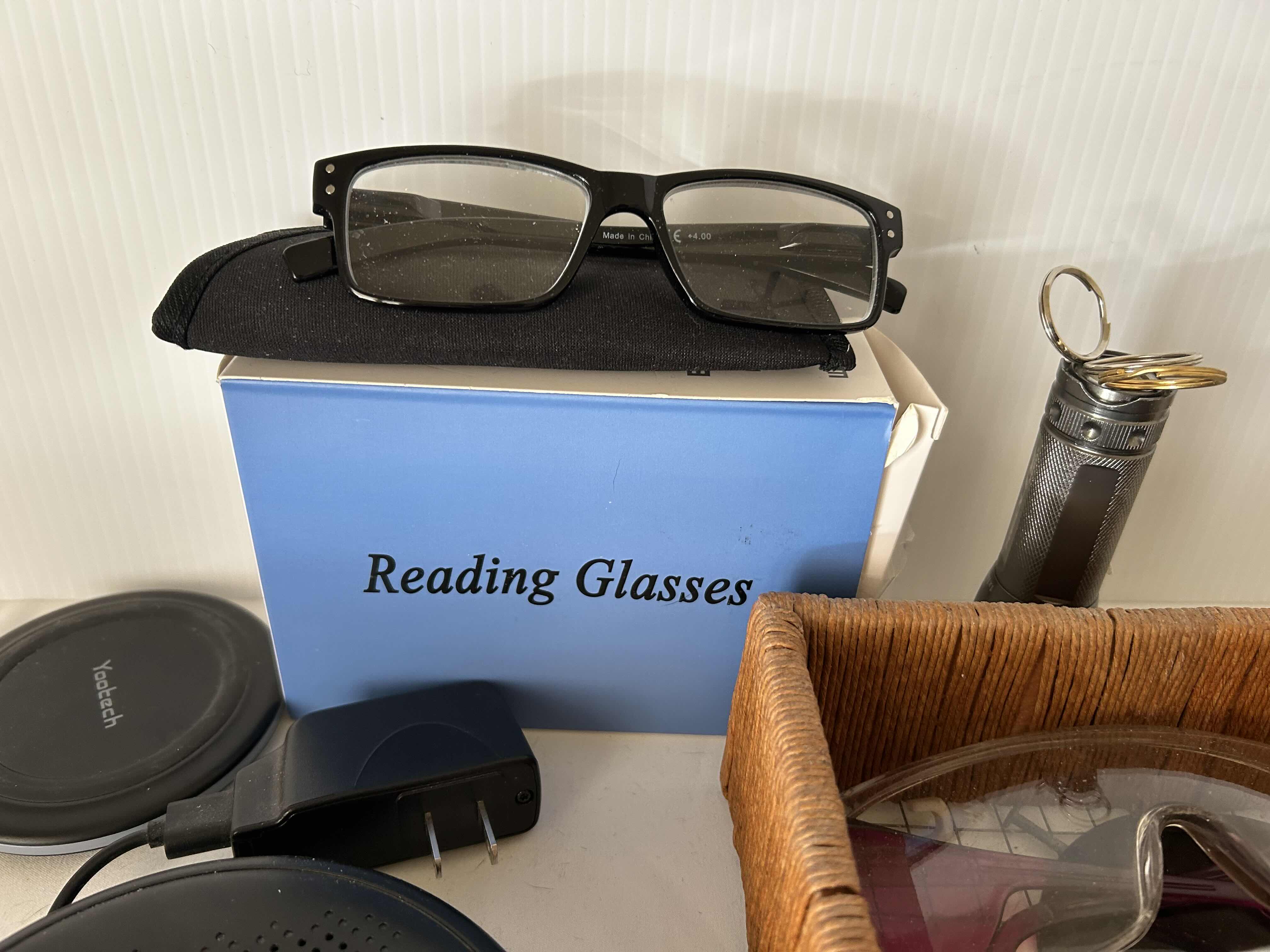 Photo 1 of ASSORTED ITEMS,READING GLASSES, PORTABLE CD PLAYER, IPHONE CASES.