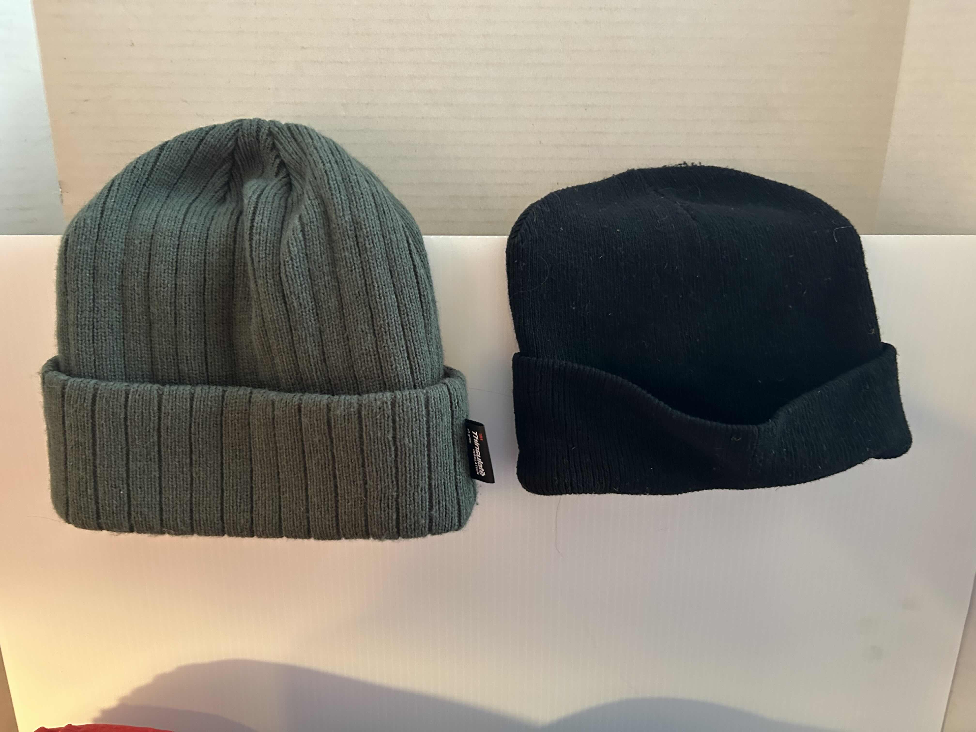 Photo 1 of 3- MICRO PACKED SLEEPING BAGS AND 2 WINTER BEANIES. CAMPING GEAR AND ACCESSORIES.