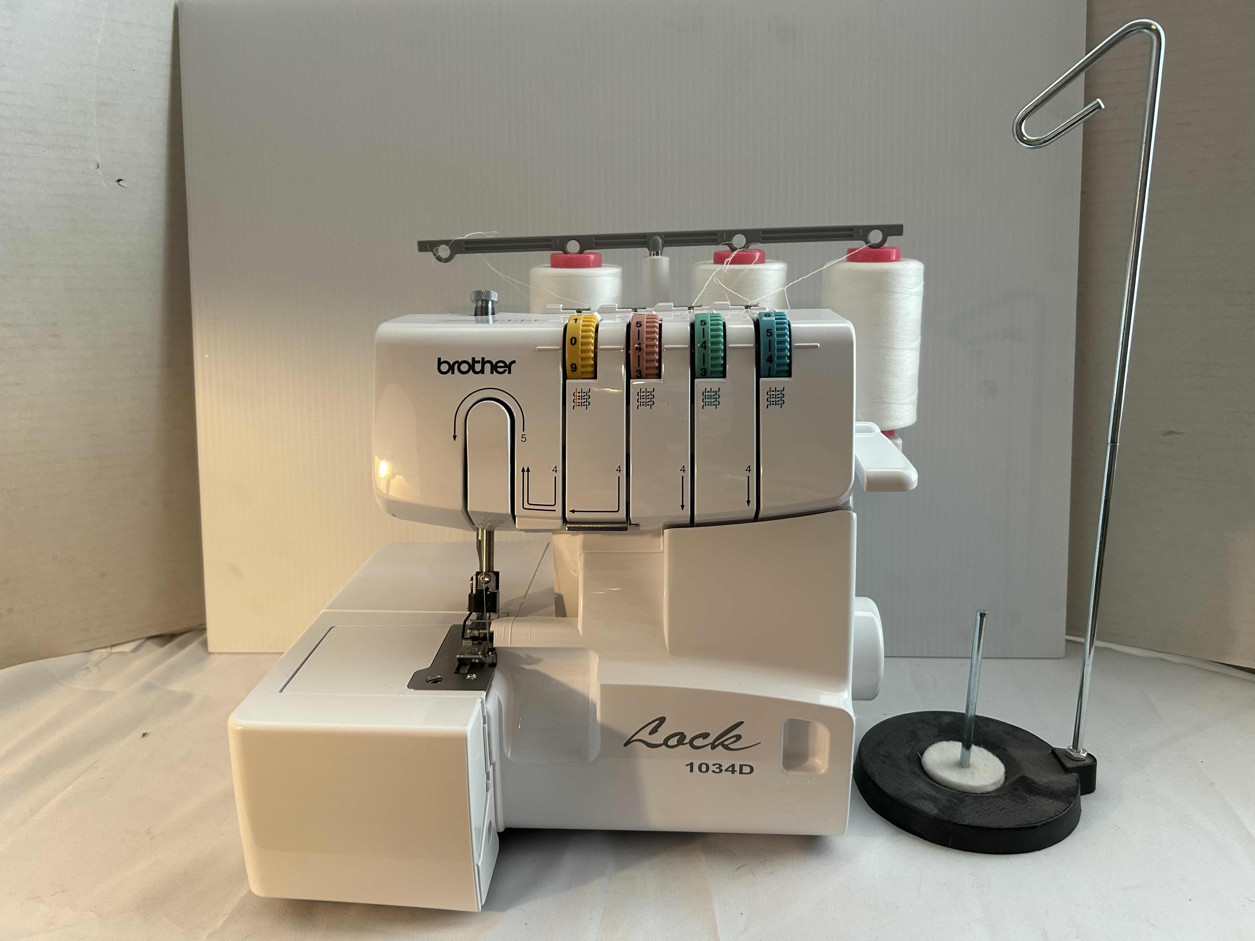 Photo 1 of BROTHER LOCK 1034D- SERGER/OVERLOCK MACHINE WITH EASY LAY-IN THREADING. SEWING MACHINE. 