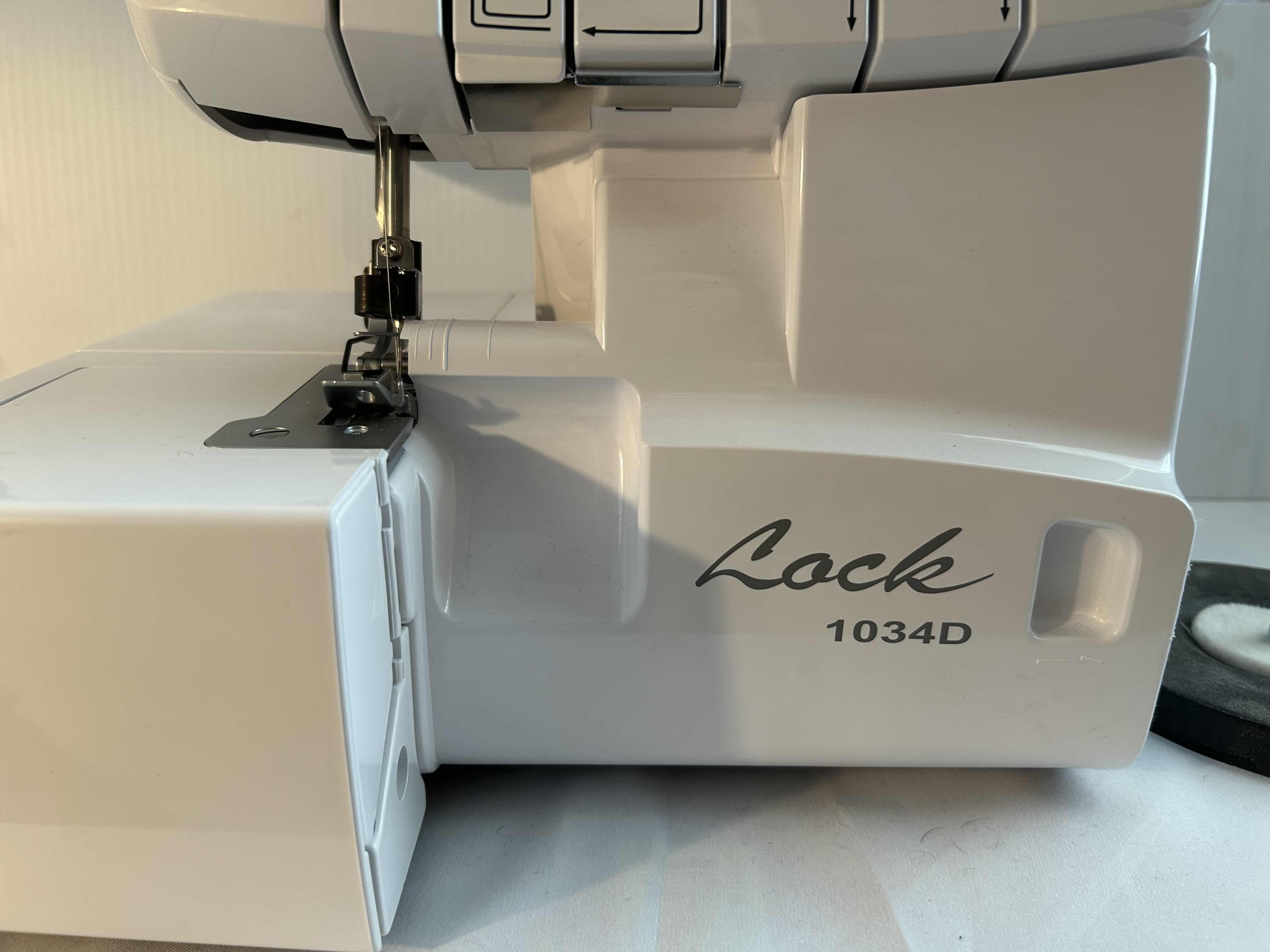 Photo 1 of BROTHER LOCK 1034D- SERGER/OVERLOCK MACHINE WITH EASY LAY-IN THREADING. SEWING MACHINE. 