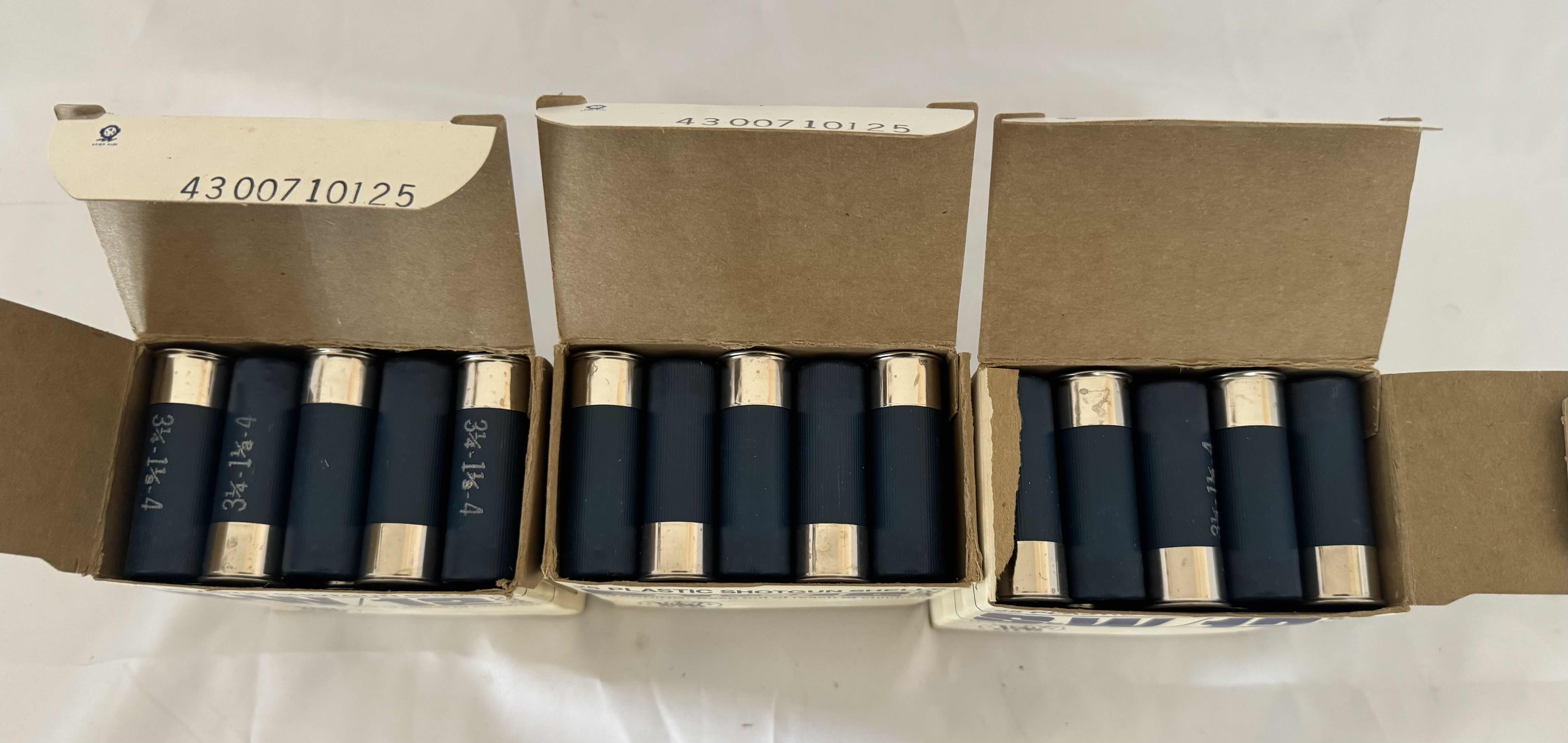 Photo 1 of 3 BOXES OF SMITH AND WESSON 12 GAUGE 25 PLASTIC SHOTGUN SHELLS.