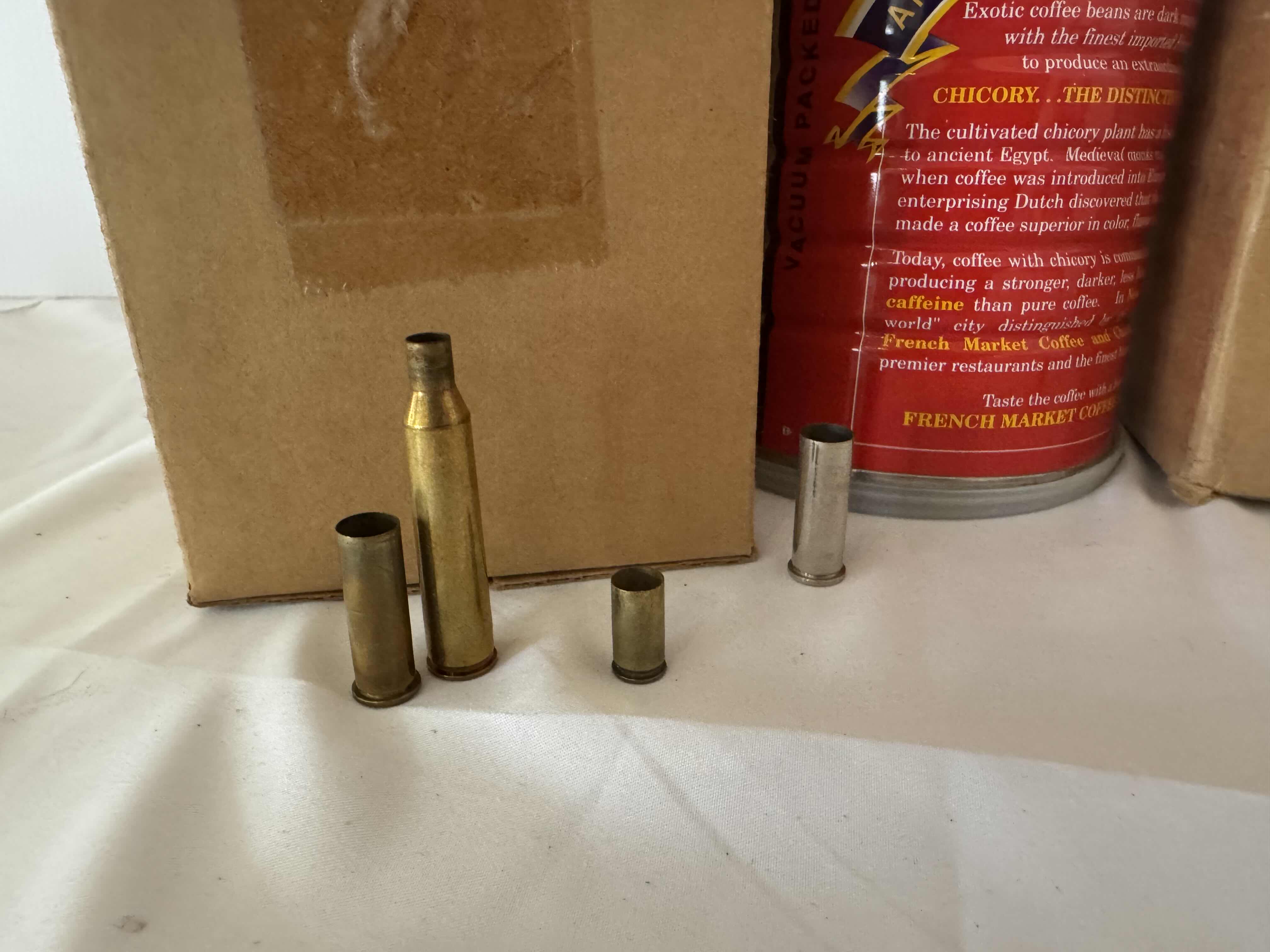 Photo 1 of ASSORTED SHELL CASINGS-AMMUNITION ACCESSORIES FOR FIREARMS.