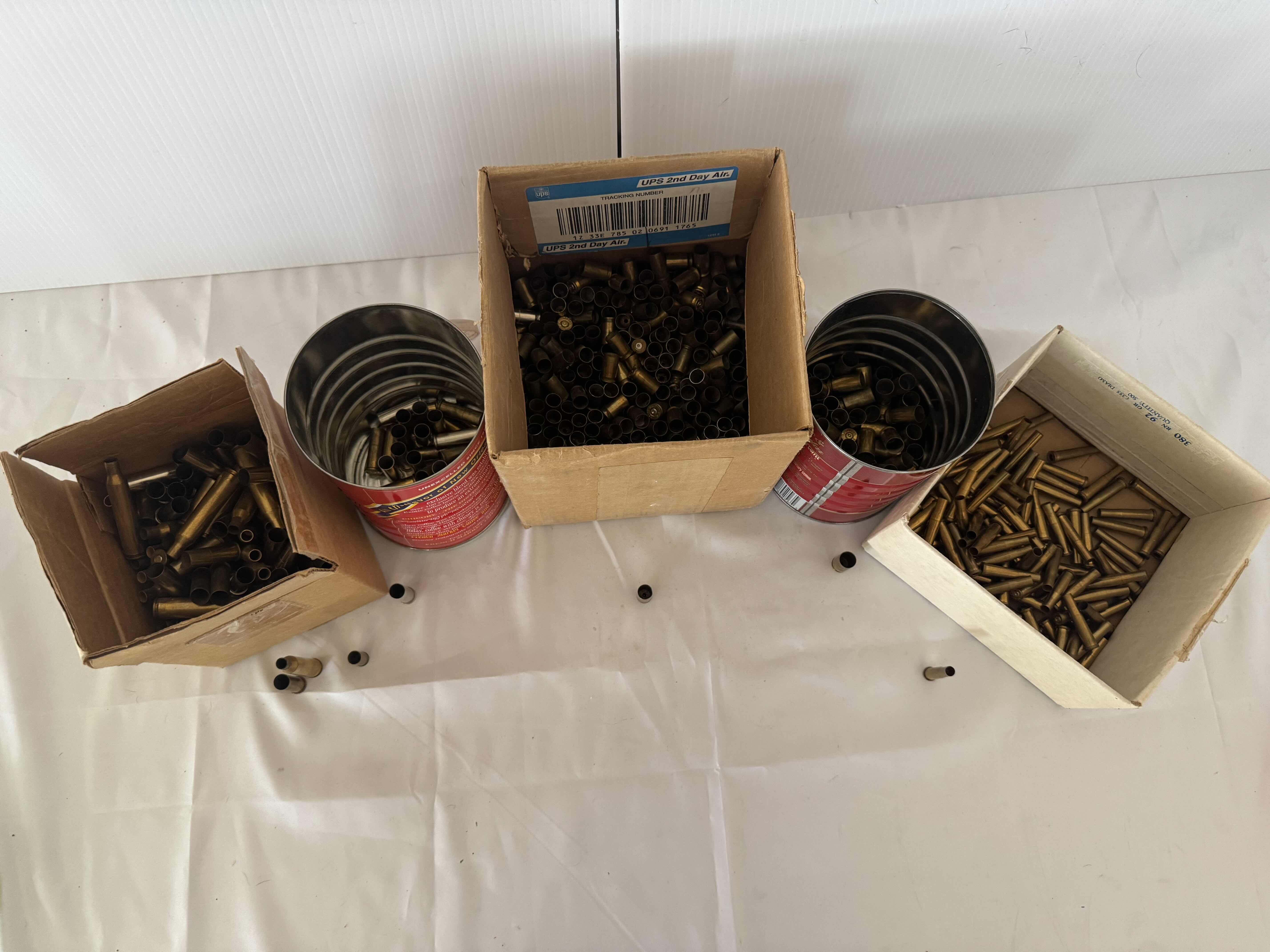 Photo 1 of ASSORTED SHELL CASINGS-AMMUNITION ACCESSORIES FOR FIREARMS.