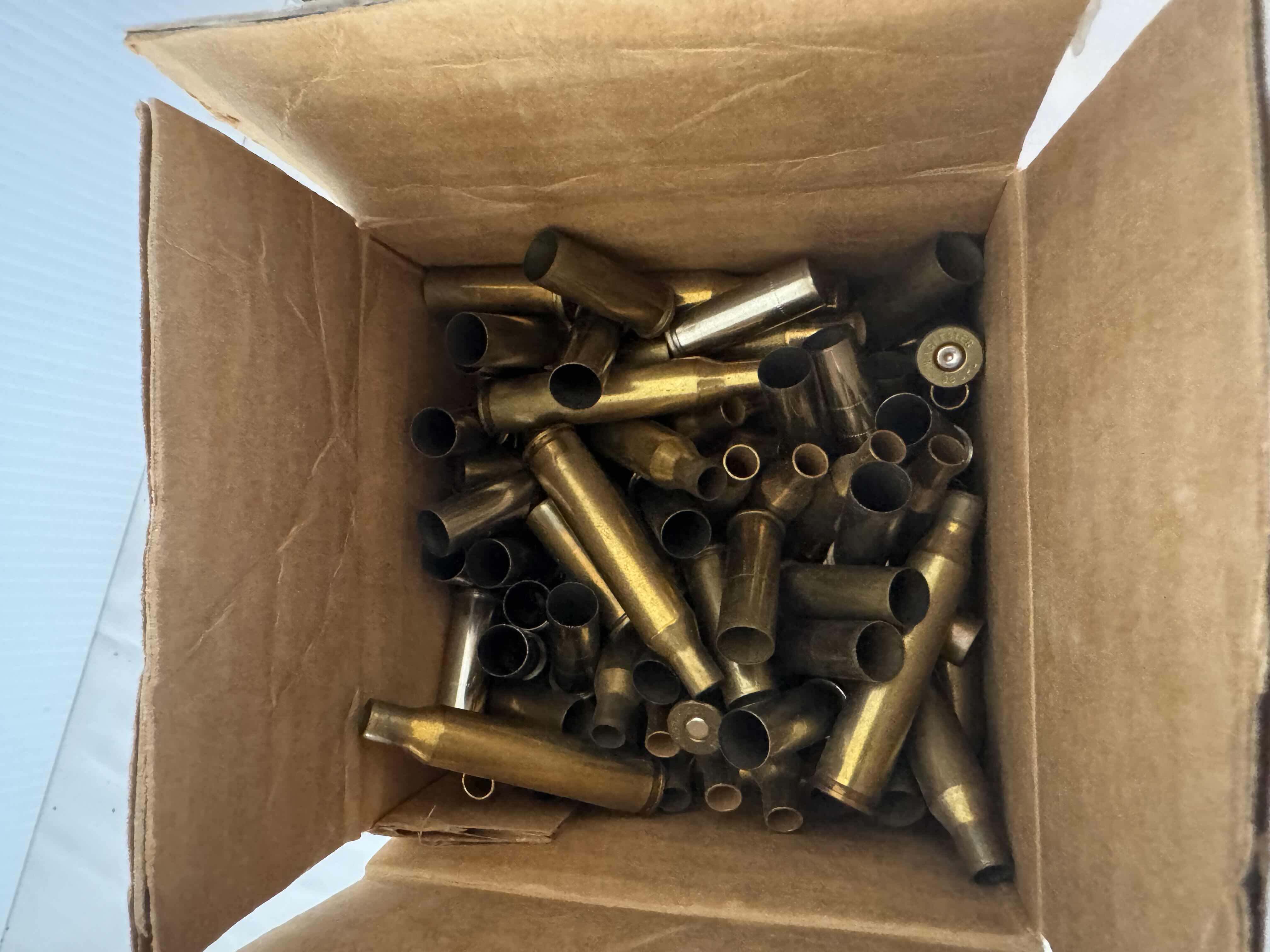 Photo 1 of ASSORTED SHELL CASINGS-AMMUNITION ACCESSORIES FOR FIREARMS.